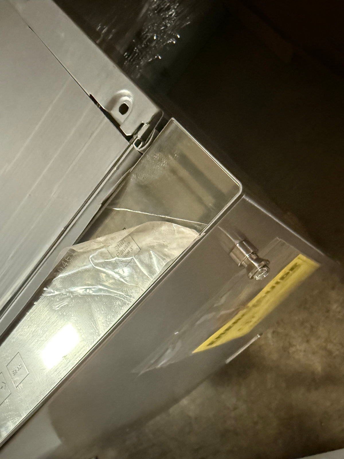Commercial style luxury dishwasher with integrated top controls and professional handle