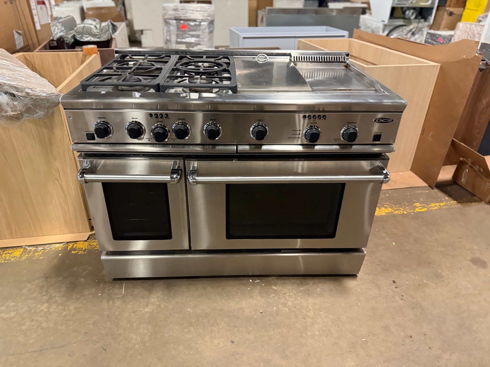 High-end commercial-style stainless steel 48 in DCS range with burners and grill