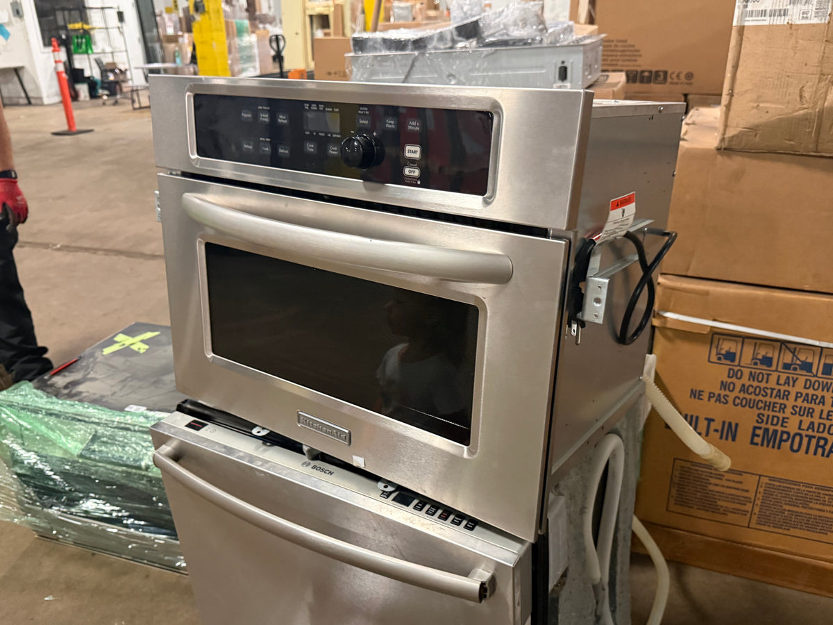 Luxury architectural kitchen microwave with electronic touch pad and glass window