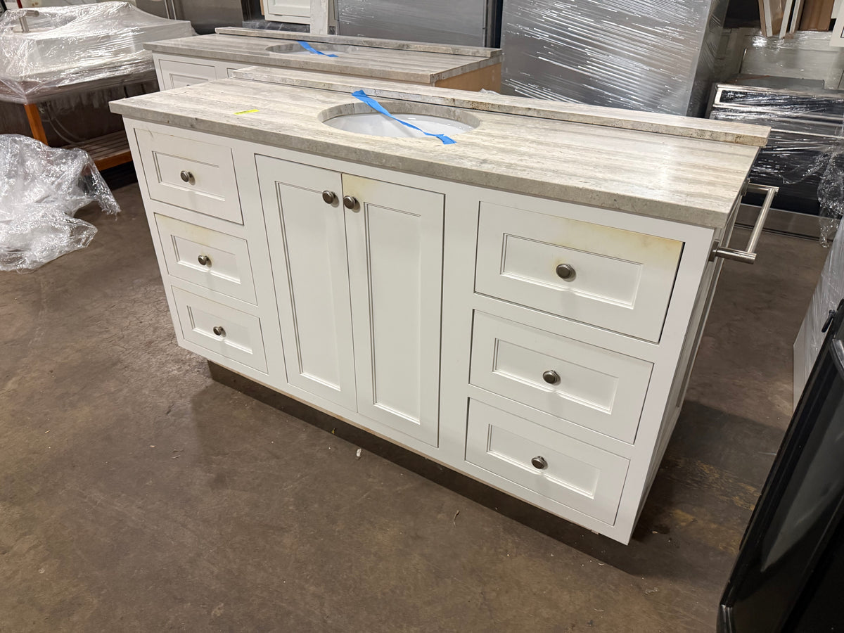 High-end architectural white primary bath sink base with transitional millwork