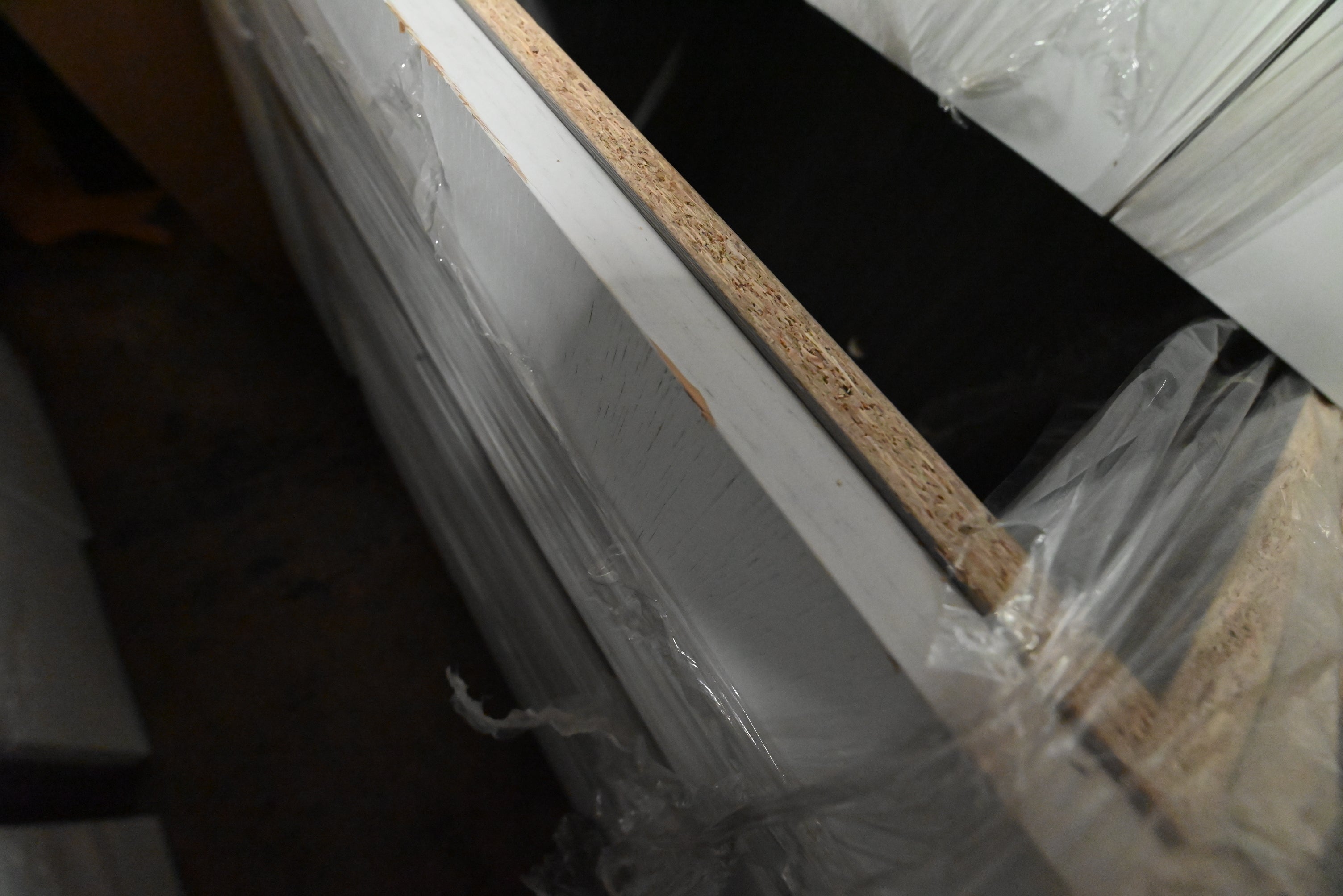 "The Strata" Modern White Textured Wood Kitchen with Island and Quartz Countertops