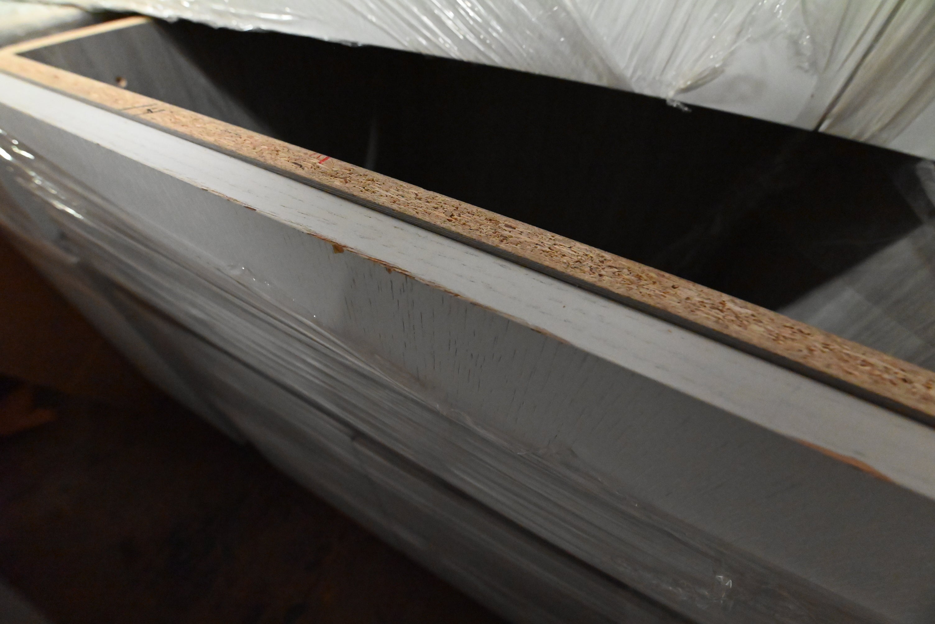 "The Strata" Modern White Textured Wood Kitchen with Island and Quartz Countertops