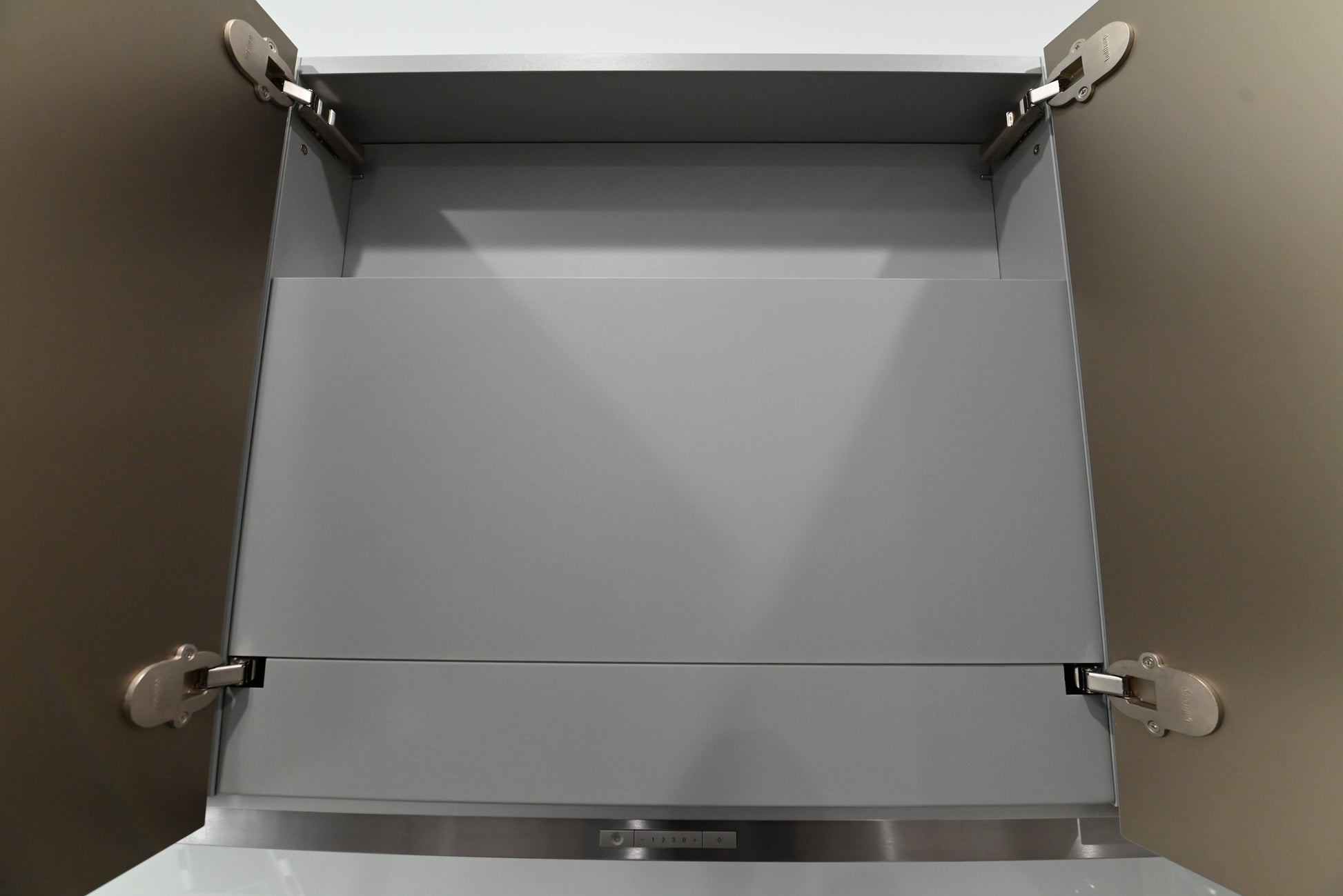 Bulthaup Modern Metallic Bronze Upper Cabinets with Glass Backsplash and Miele Hood Insert