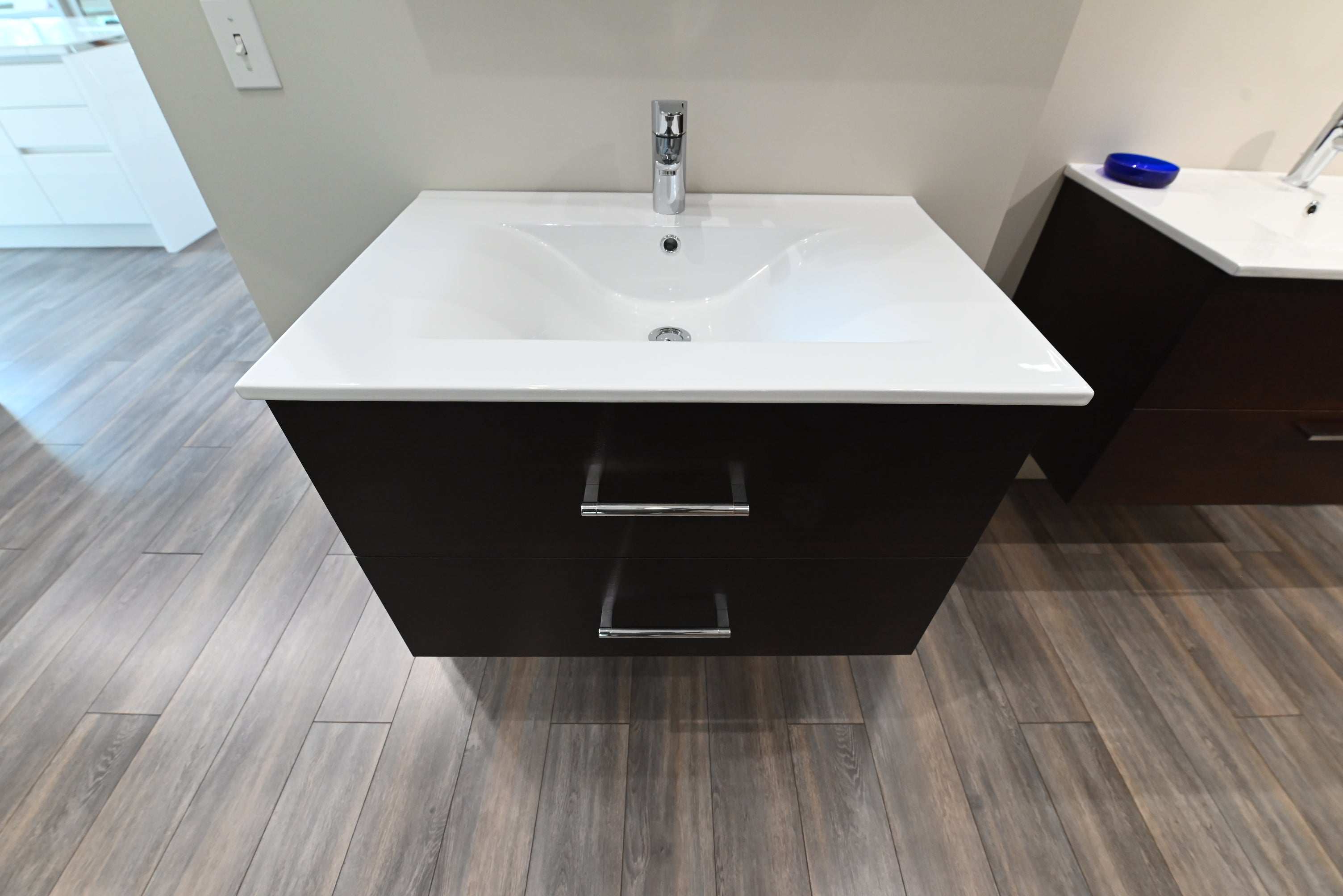 Transitional 32 inch single floating vanity with white integrated seamless sink top faucet and matching mirrored medicine cabinet front view