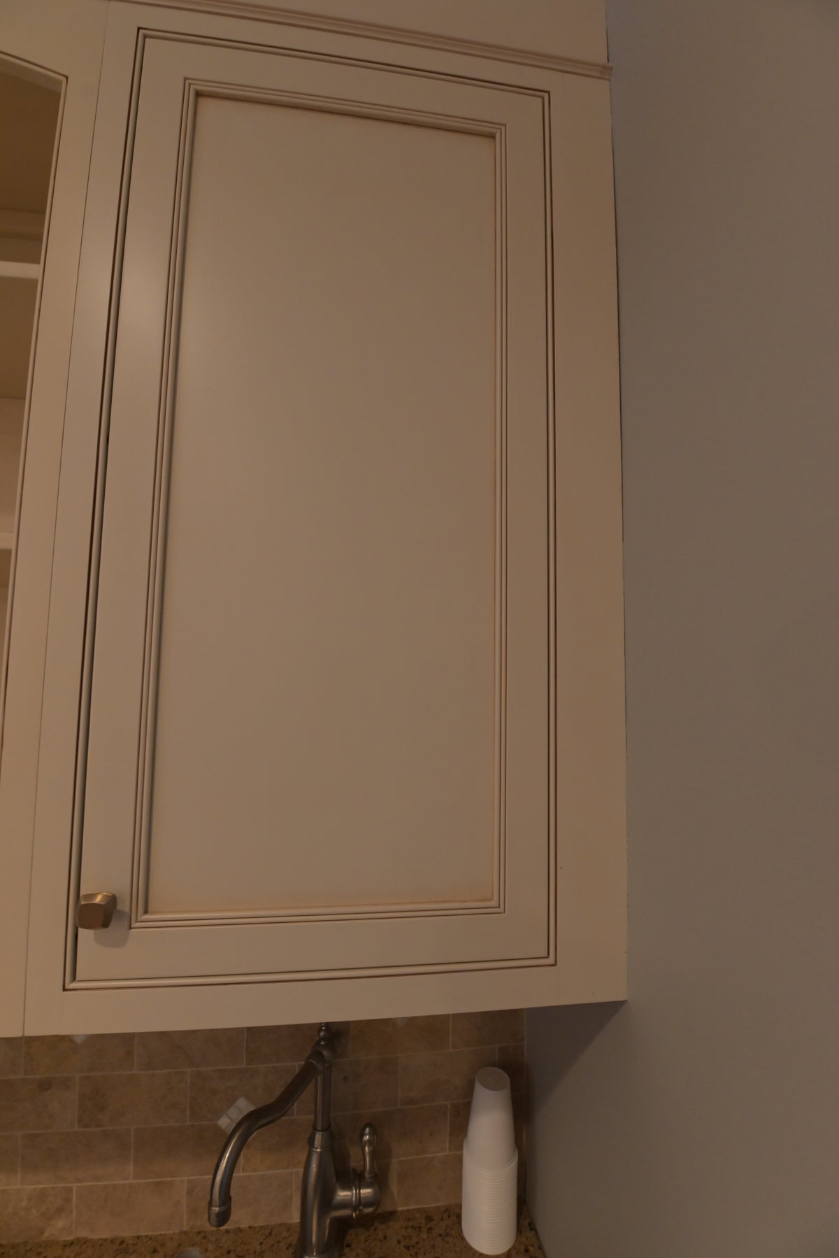 Omega Transitional Linen White Kitchen with Black Island