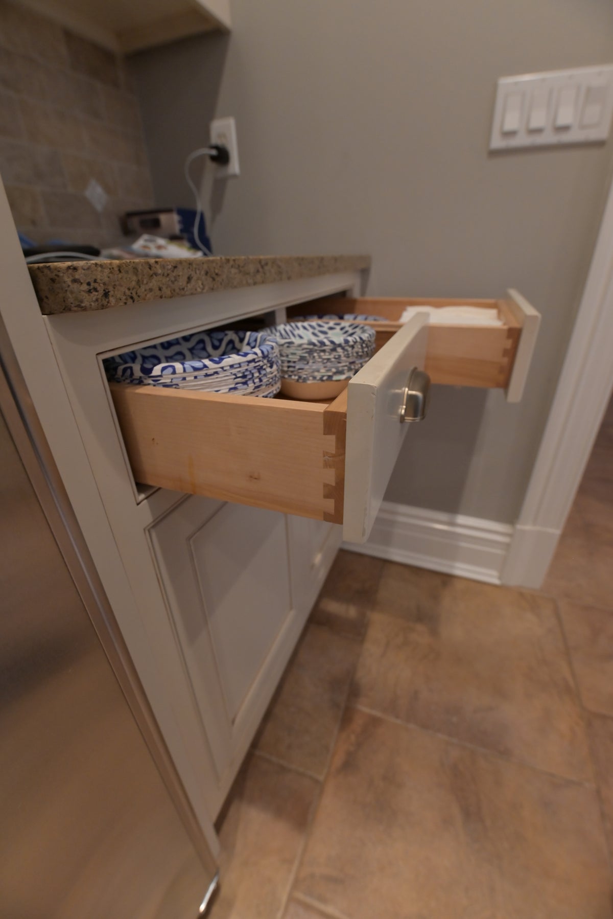 Omega Transitional Linen White Kitchen with Black Island