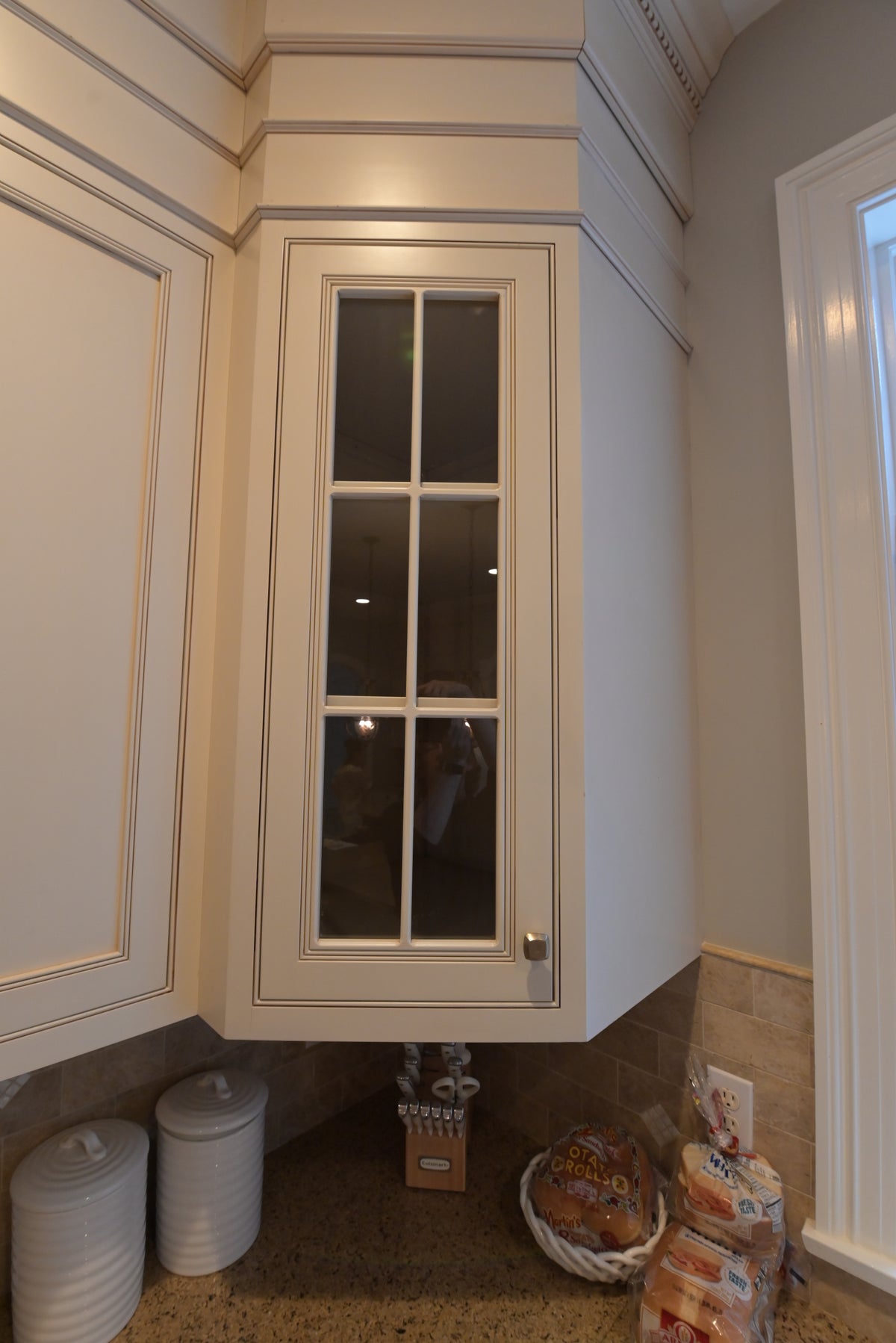 Omega Transitional Linen White Kitchen with Black Island