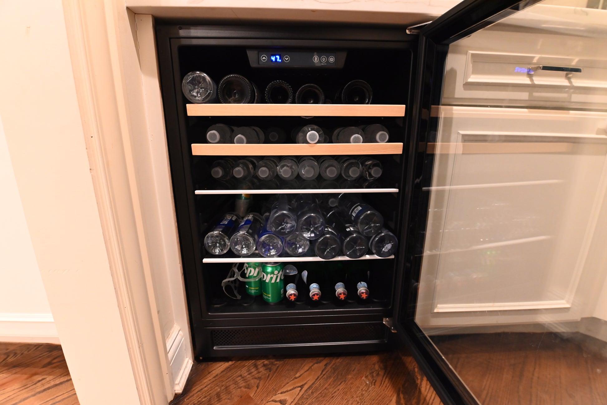 Pre owned white estate butler pantry highlighting soft close wood drawers and clean shaker doors