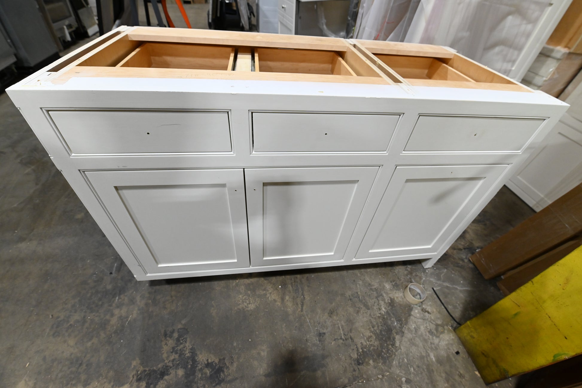 High-end pre-owned white cabinetry for kitchen or laundry room renovation