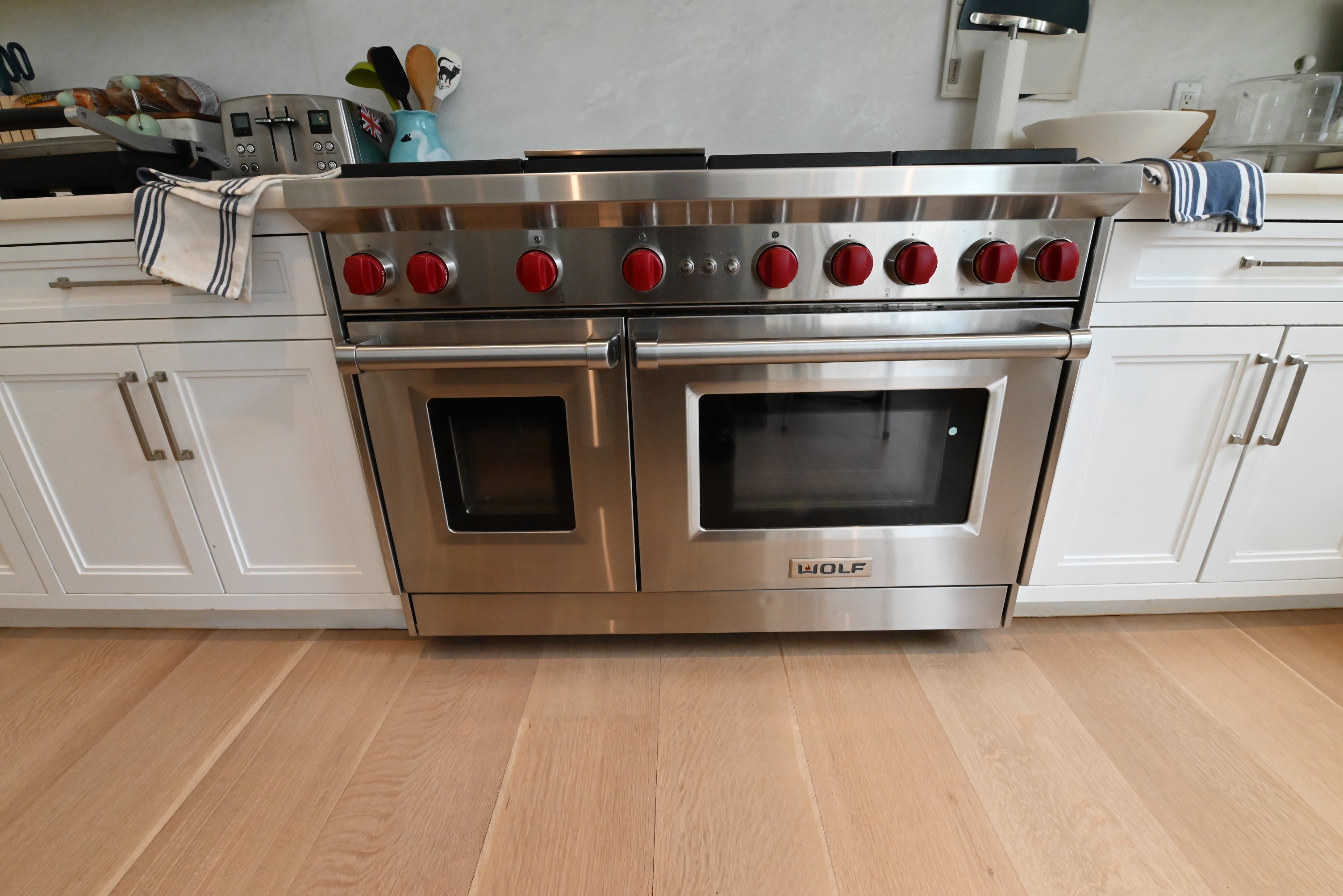 "The Abercorn" Transitional White Kitchen with Island & 48" Wolf Range