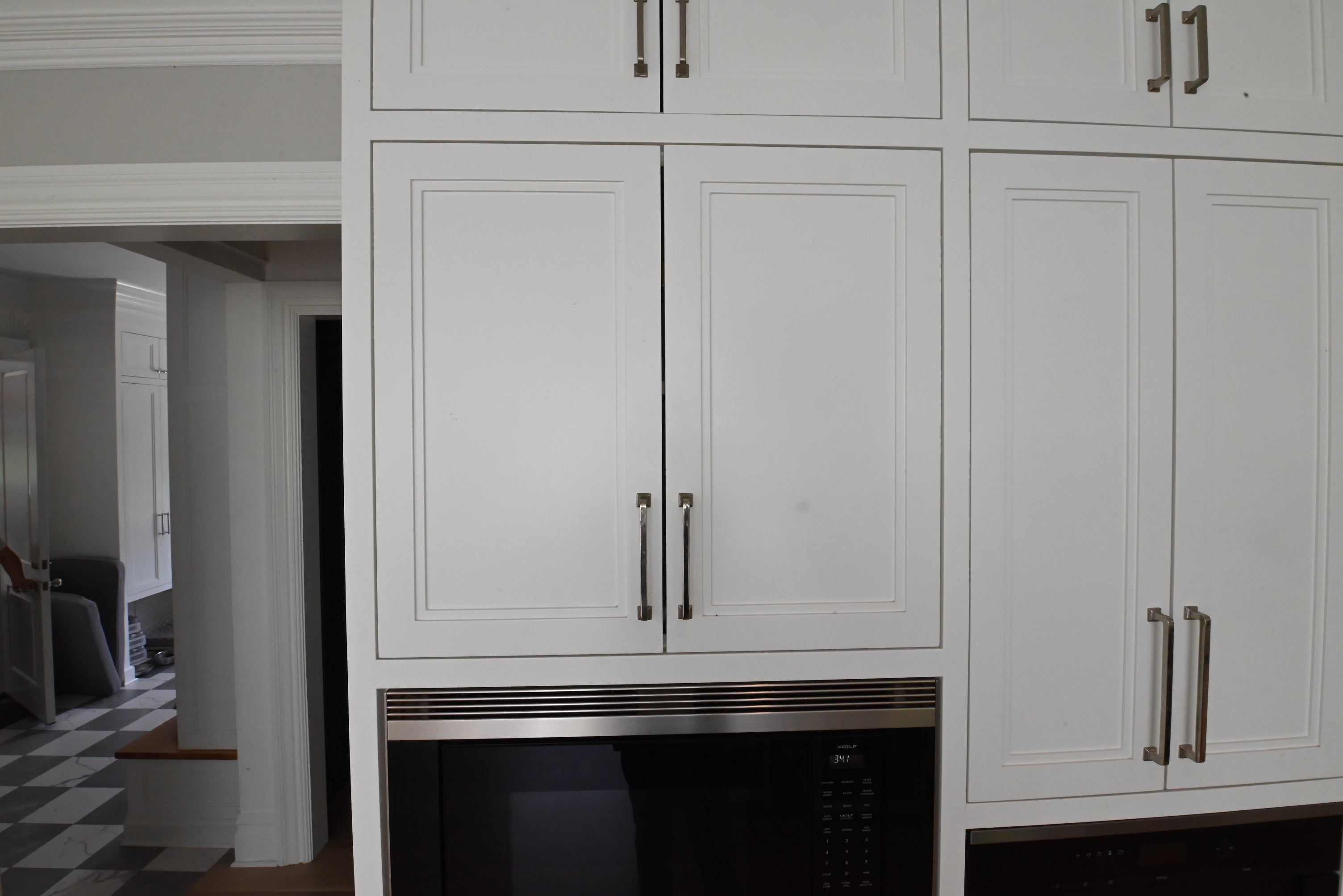 "The Abercorn" Transitional White Kitchen with Island & 48" Wolf Range