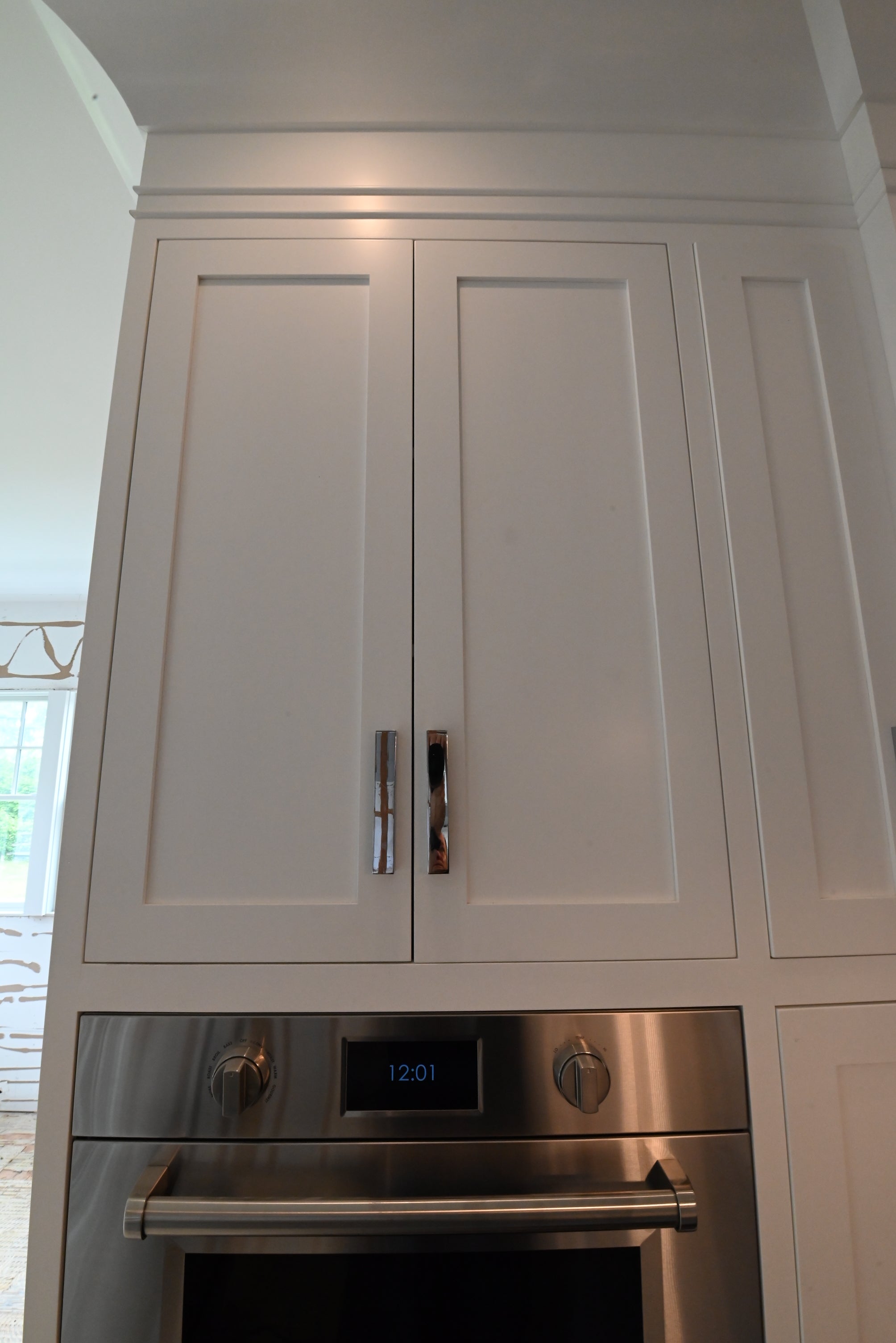 “The Pembroke” Transitional White Kitchen with Island, Wolf & Sub-Zero Appliances