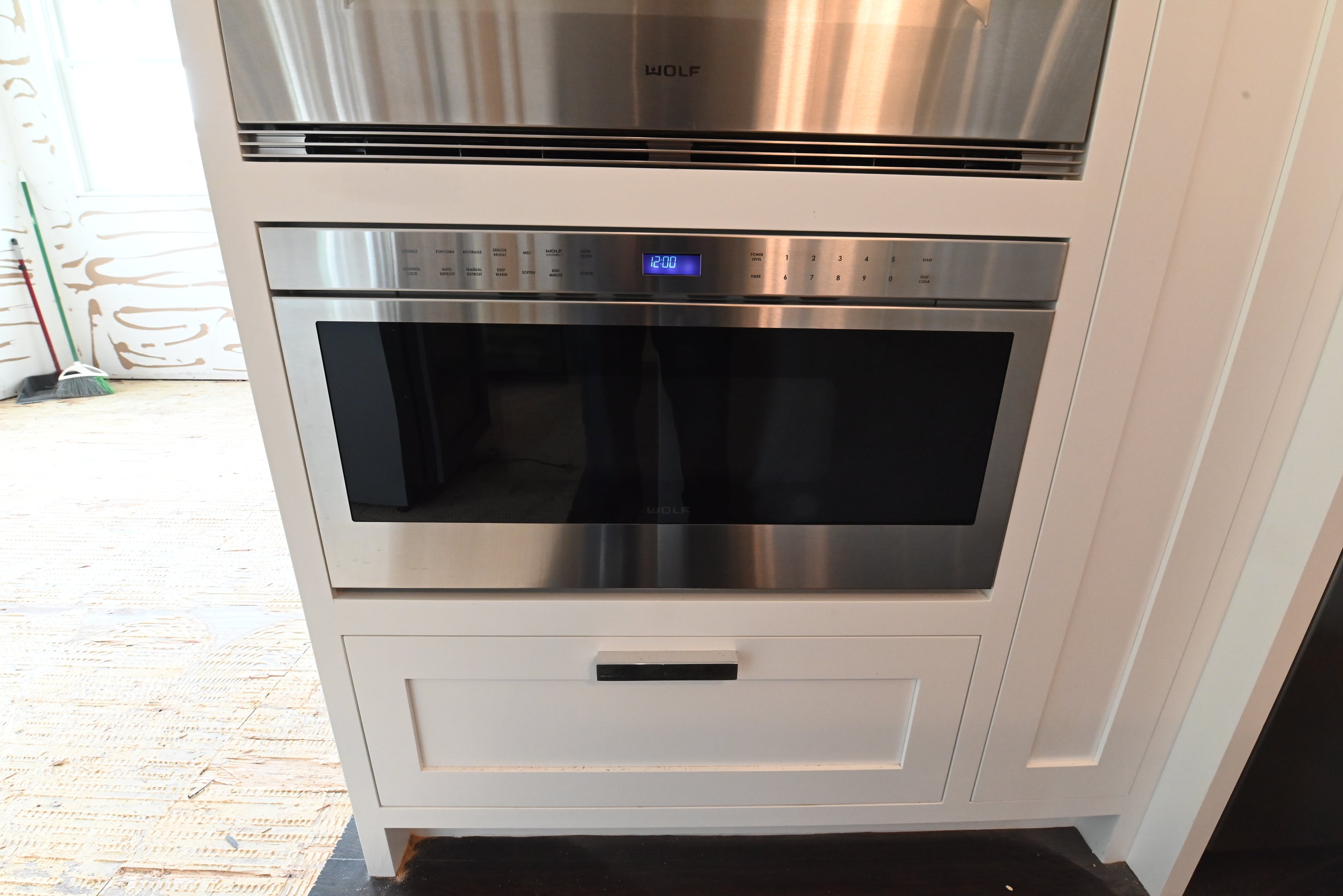 “The Pembroke” Transitional White Kitchen with Island, Wolf & Sub-Zero Appliances