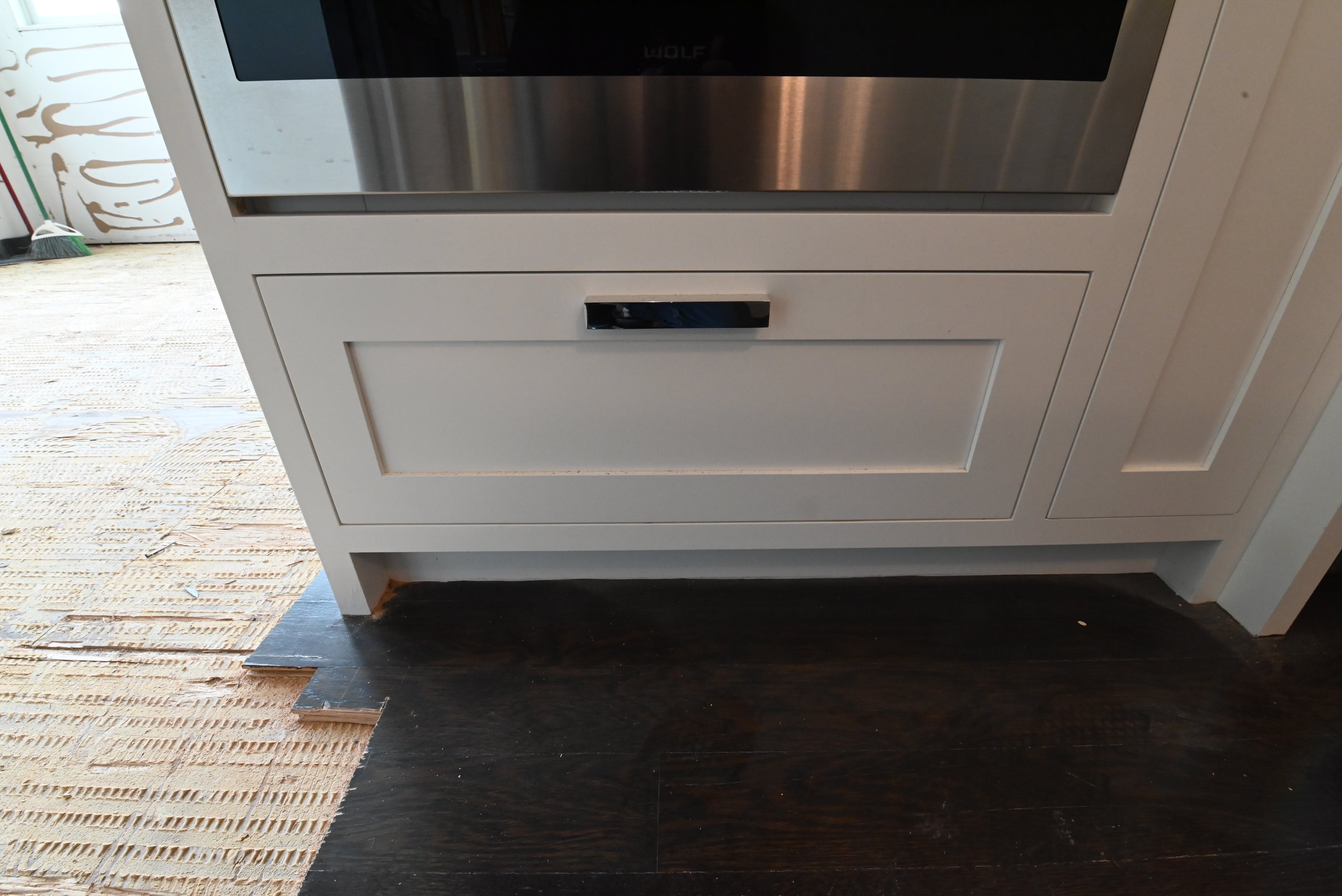 “The Pembroke” Transitional White Kitchen with Island, Wolf & Sub-Zero Appliances