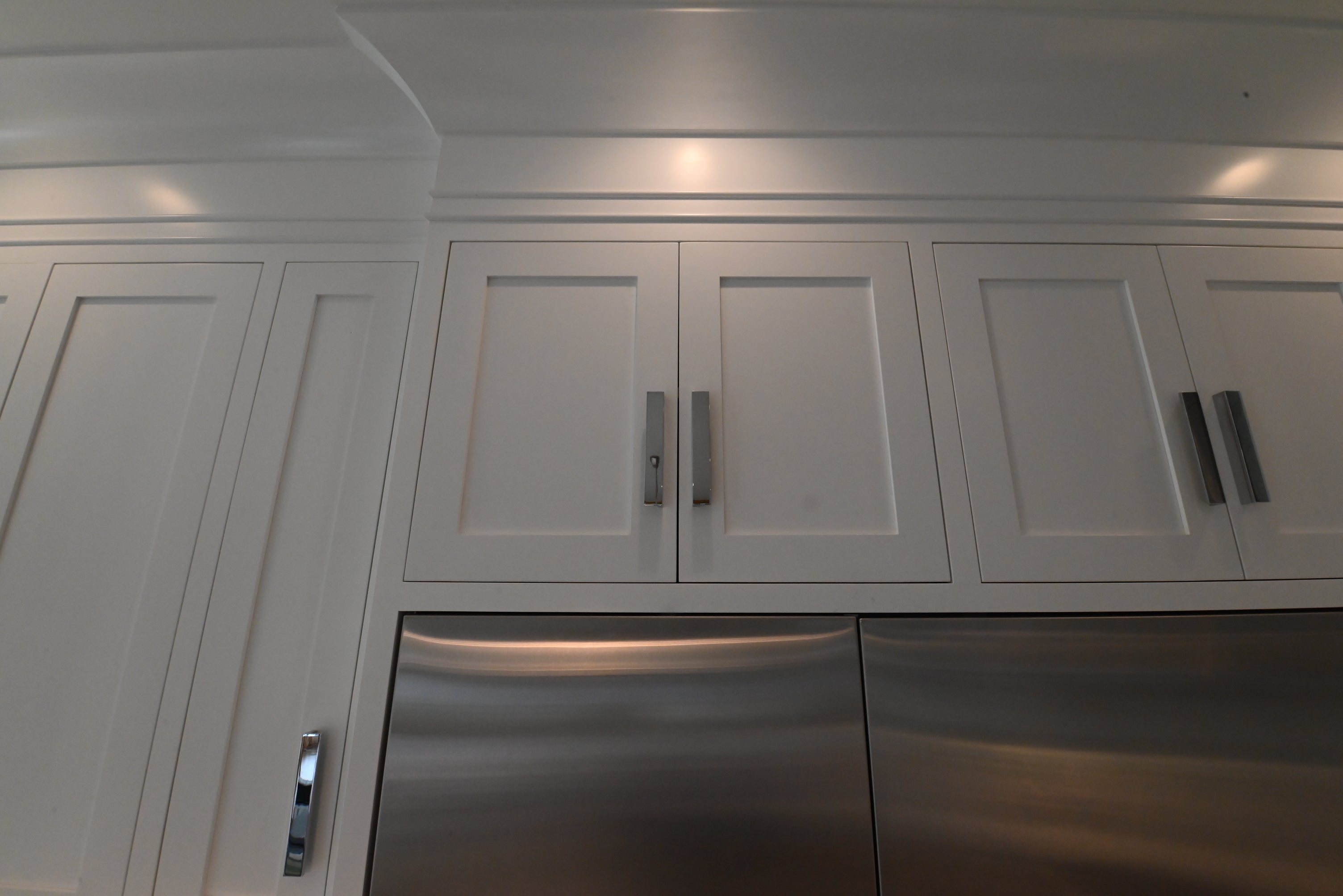 “The Pembroke” Transitional White Kitchen with Island, Wolf & Sub-Zero Appliances