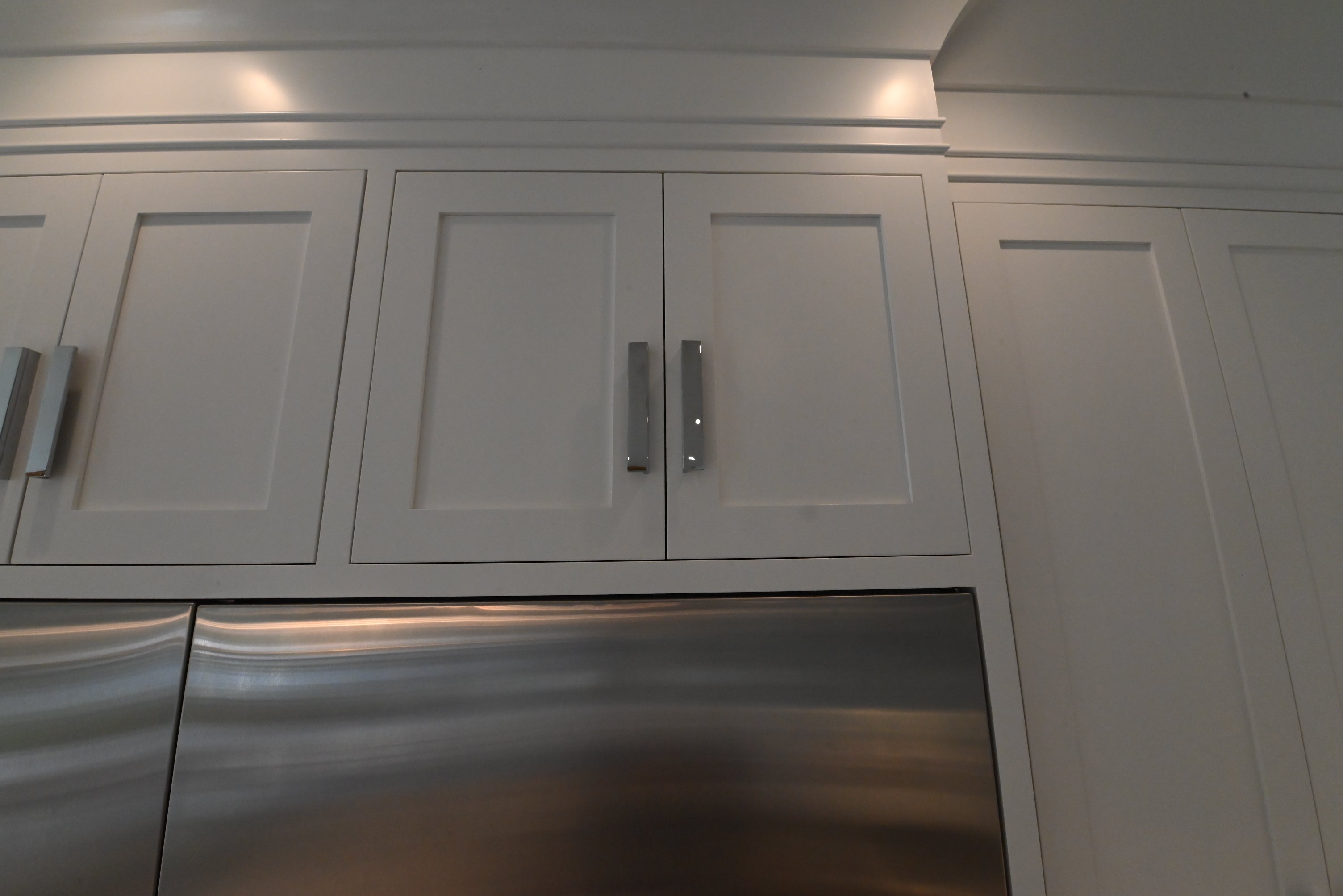 “The Pembroke” Transitional White Kitchen with Island, Wolf & Sub-Zero Appliances