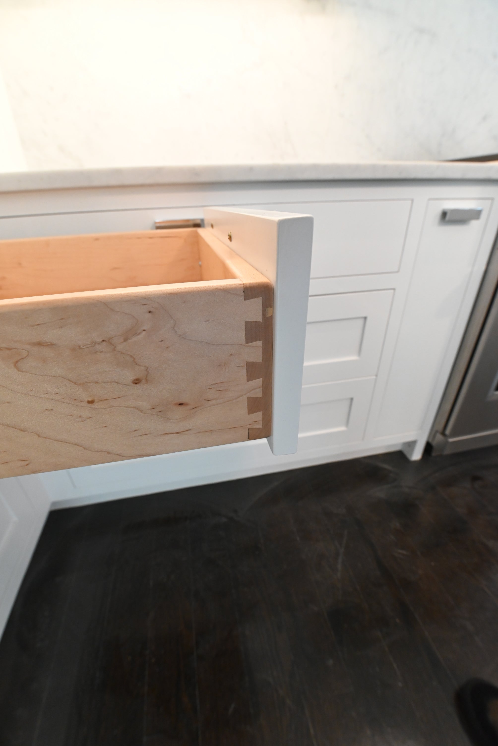 “The Pembroke” Transitional White Kitchen with Island, Wolf & Sub-Zero Appliances