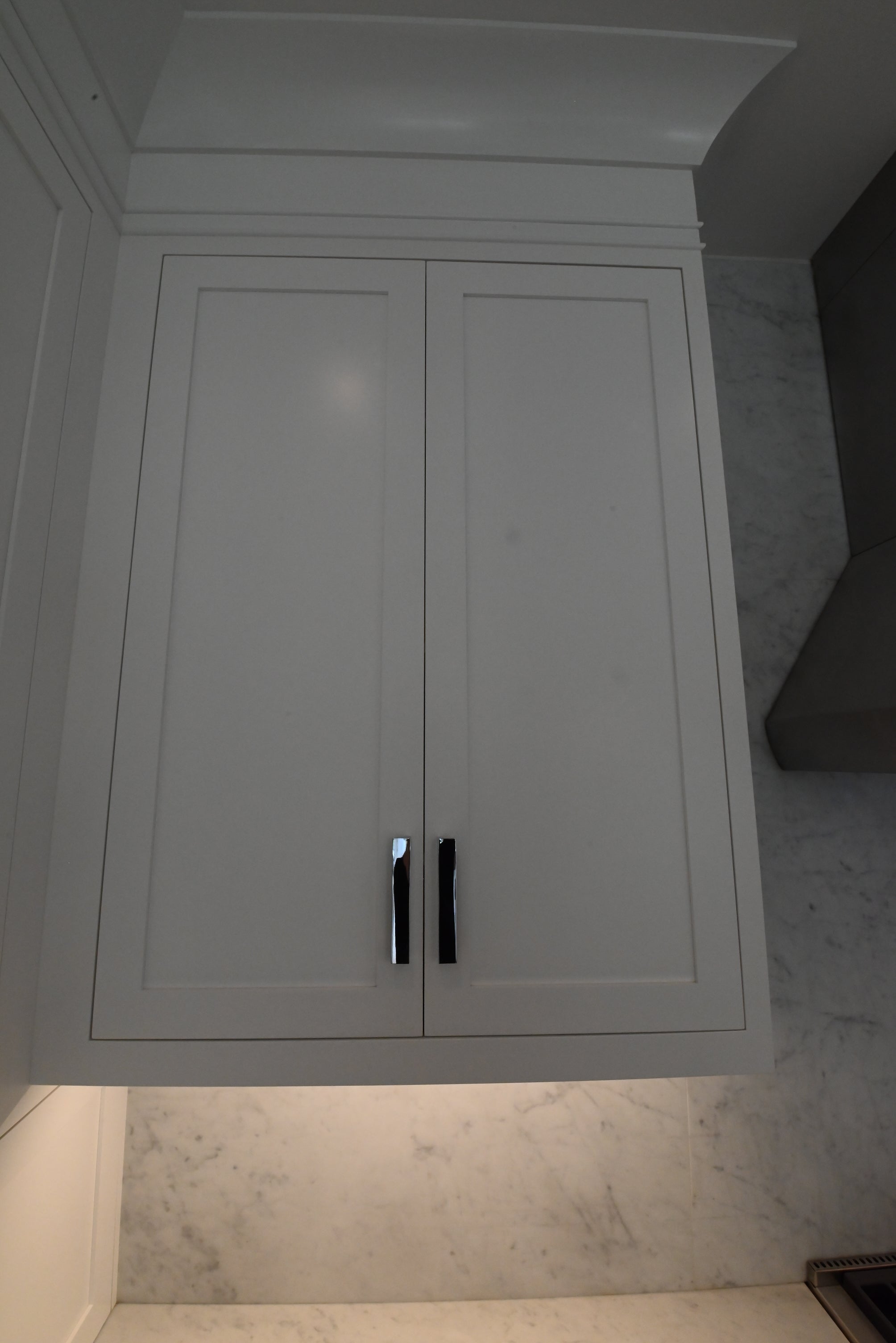 “The Pembroke” Transitional White Kitchen with Island, Wolf & Sub-Zero Appliances