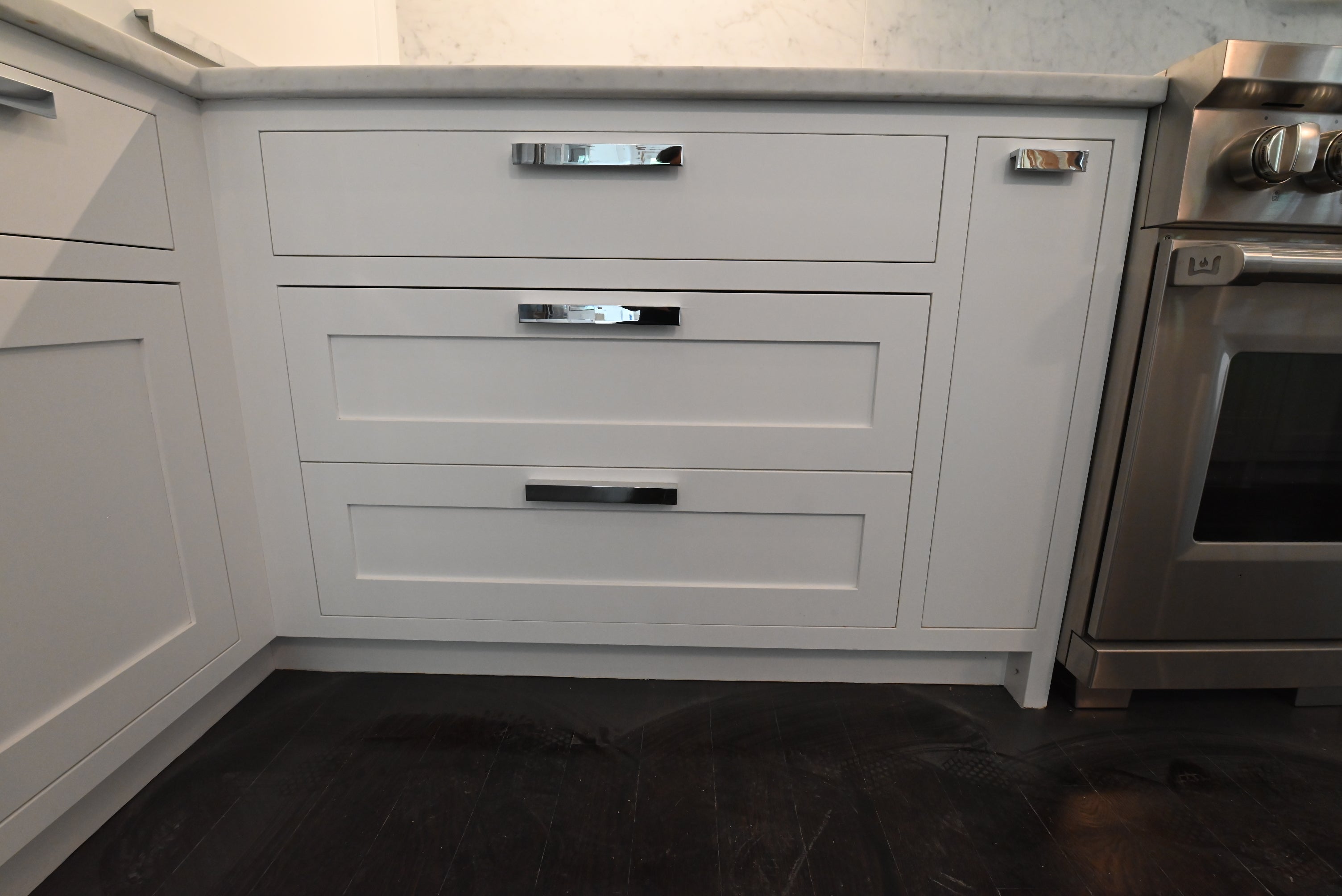 “The Pembroke” Transitional White Kitchen with Island, Wolf & Sub-Zero Appliances