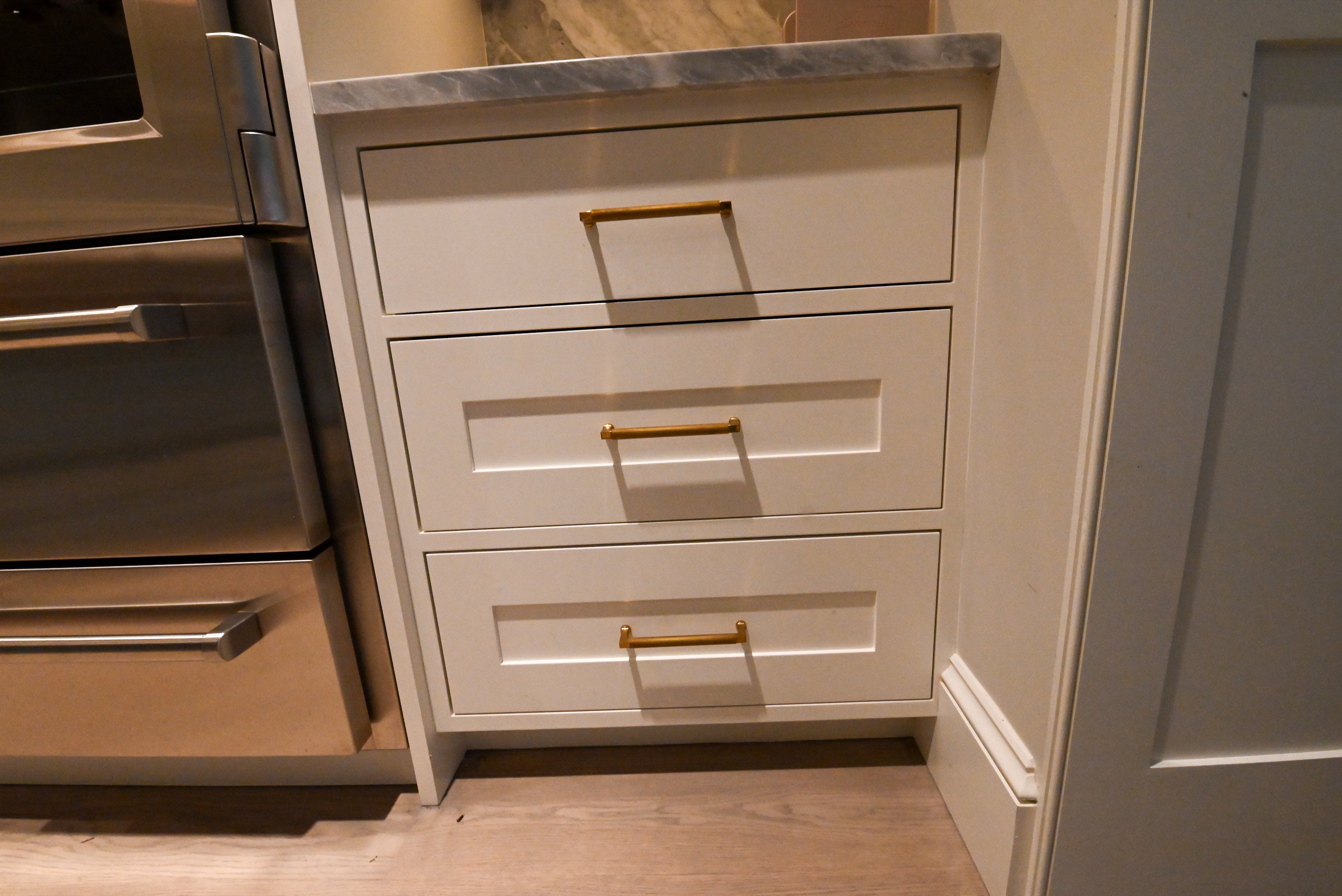 "The Windermere" Transitional White Kitchen with Island & Sub-Zero 648PROG