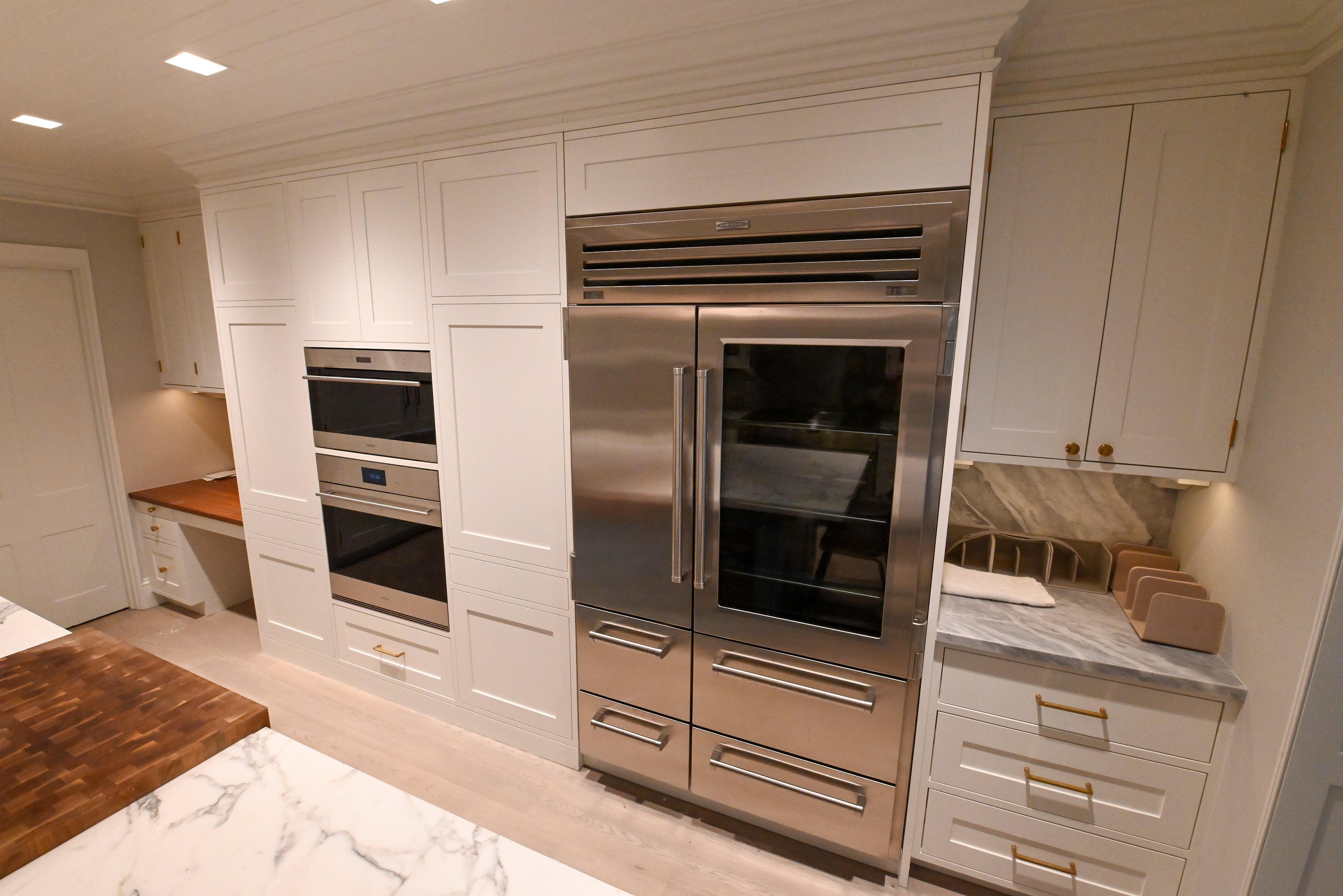 "The Windermere" Transitional White Kitchen with Island & Sub-Zero 648PROG