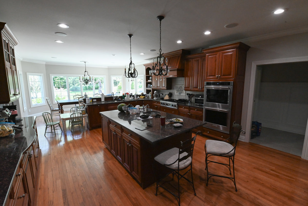 High-end architectural custom kitchen with solid hardwood and premium millwork