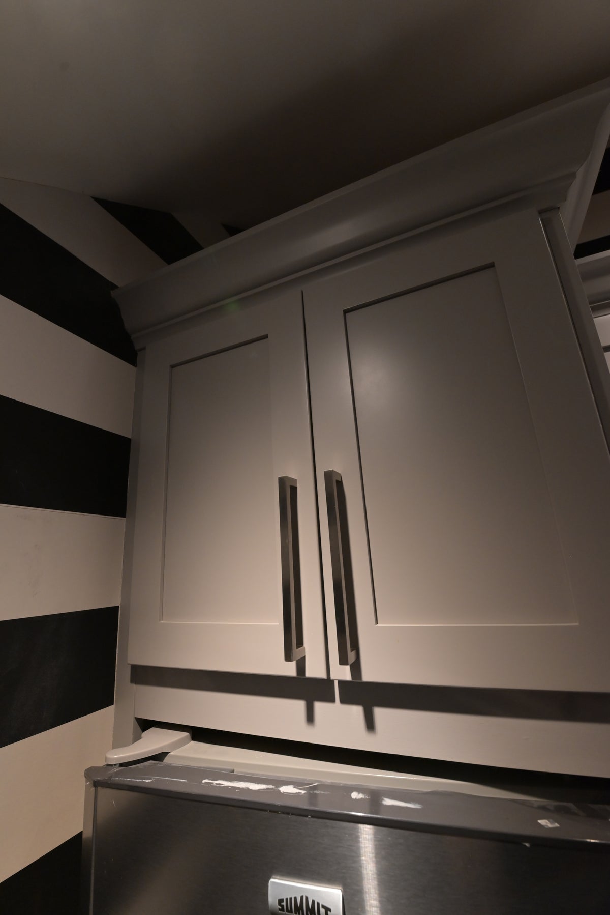 High-end residential custom millwork kitchenette cabinetry