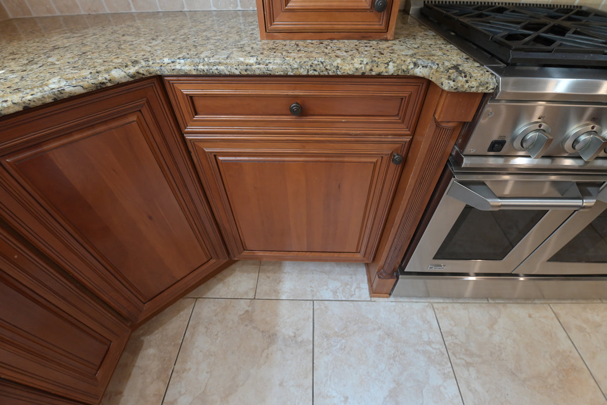 Aurora Circ traditional wooden kitchen cabinets with raised panel doors granite countertop and stainless steel range