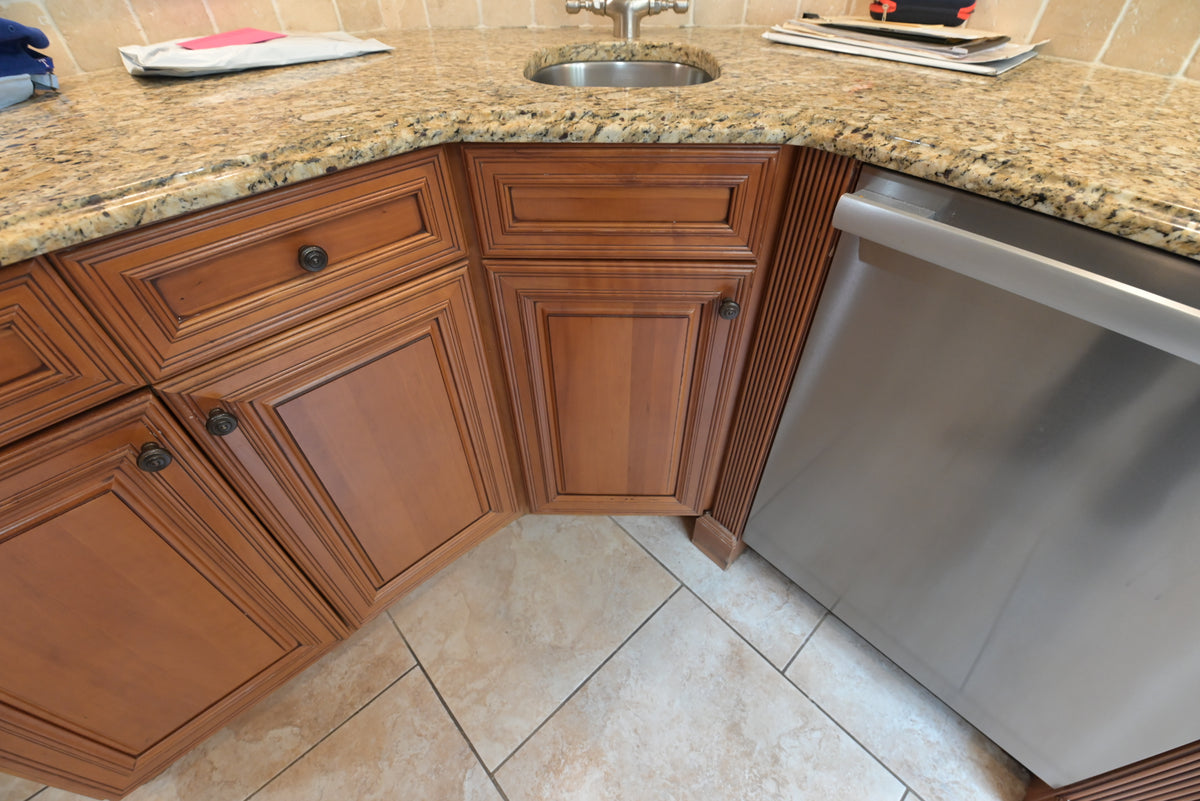 Aurora Circ traditional wooden kitchen cabinets with raised panel doors granite countertop sink and stainless steel dishwasher