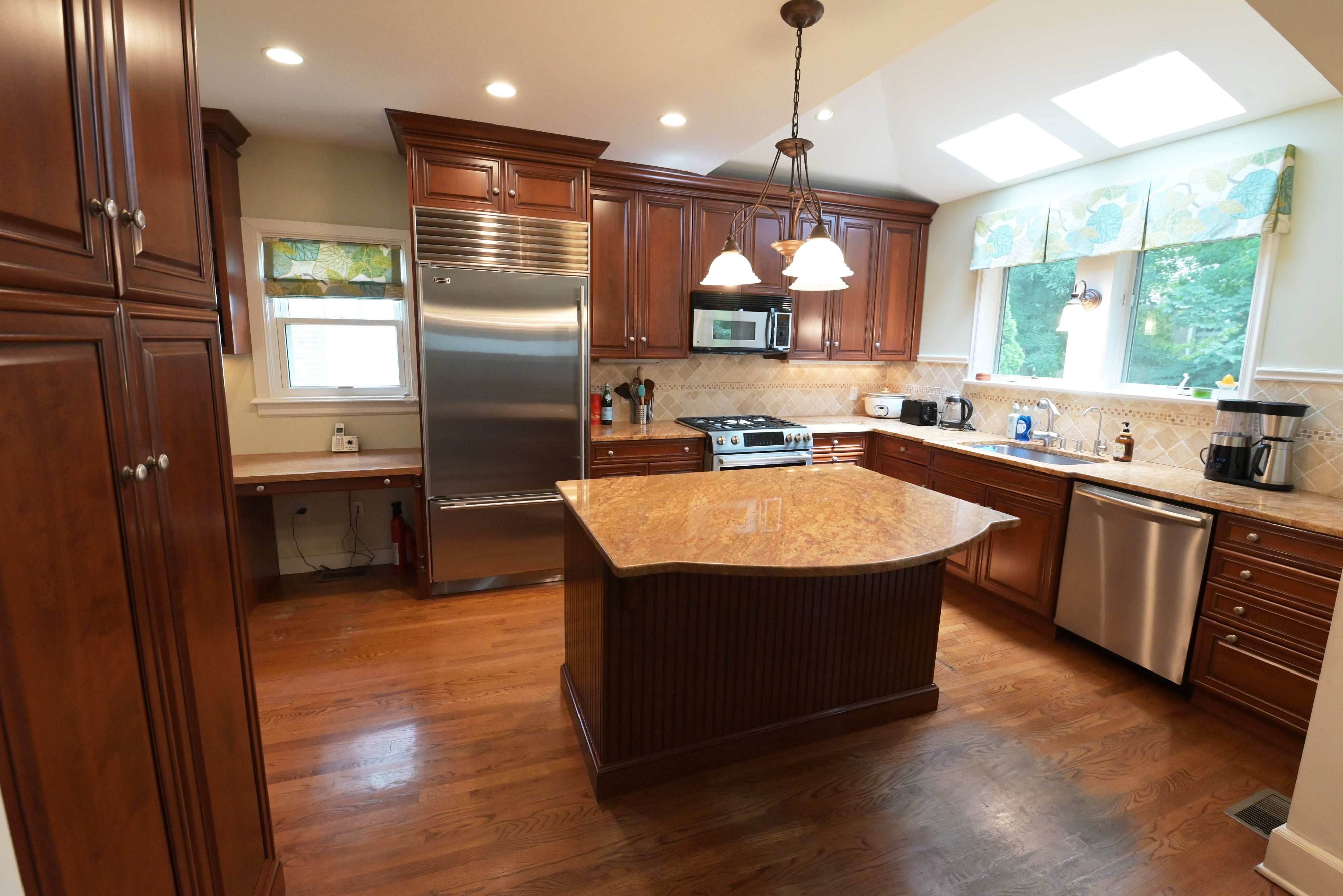 Brookhaven Traditional Wooden Kitchen with Island & Sub-Zero Refrigerator