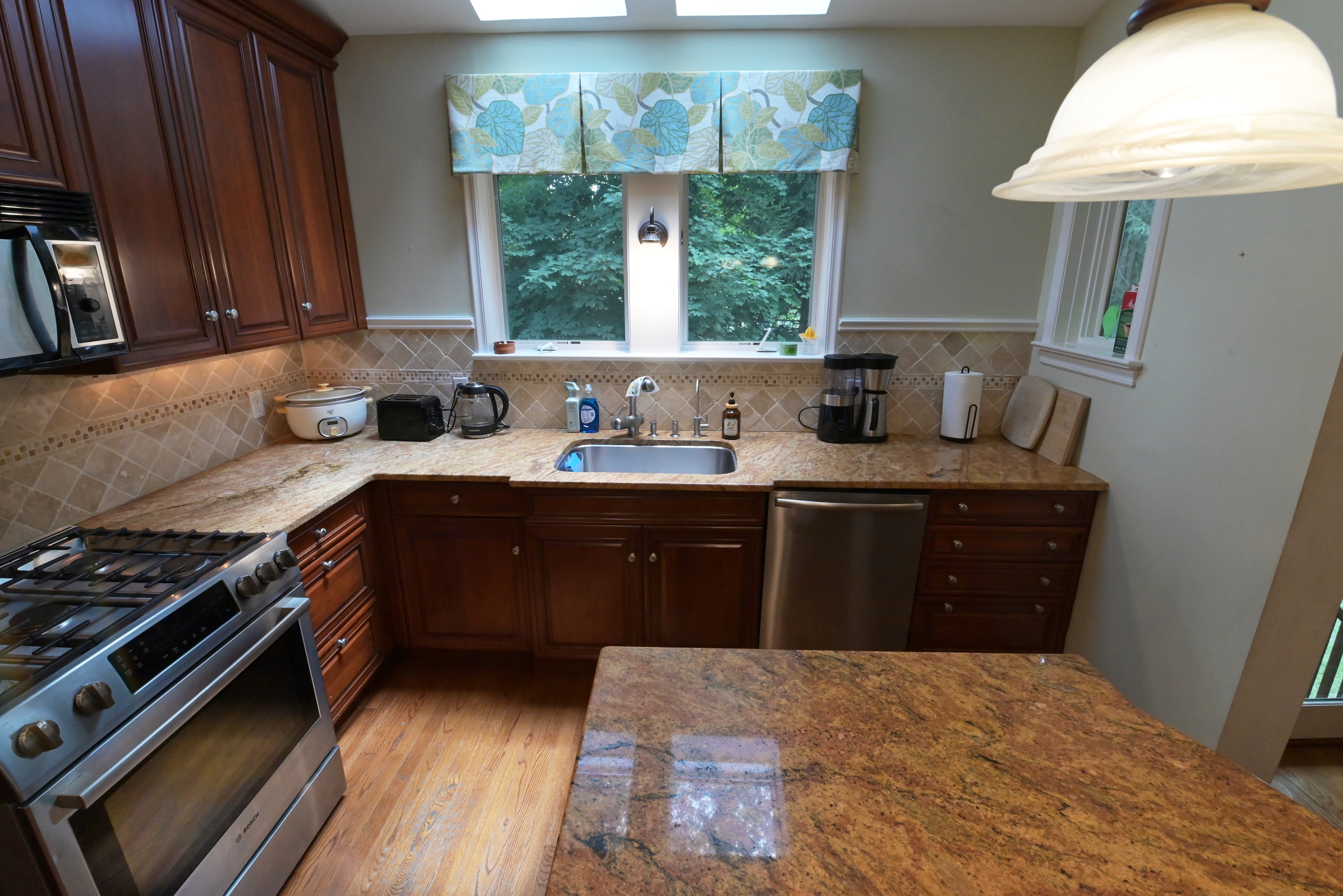 Brookhaven Traditional Wooden Kitchen with Island & Sub-Zero Refrigerator