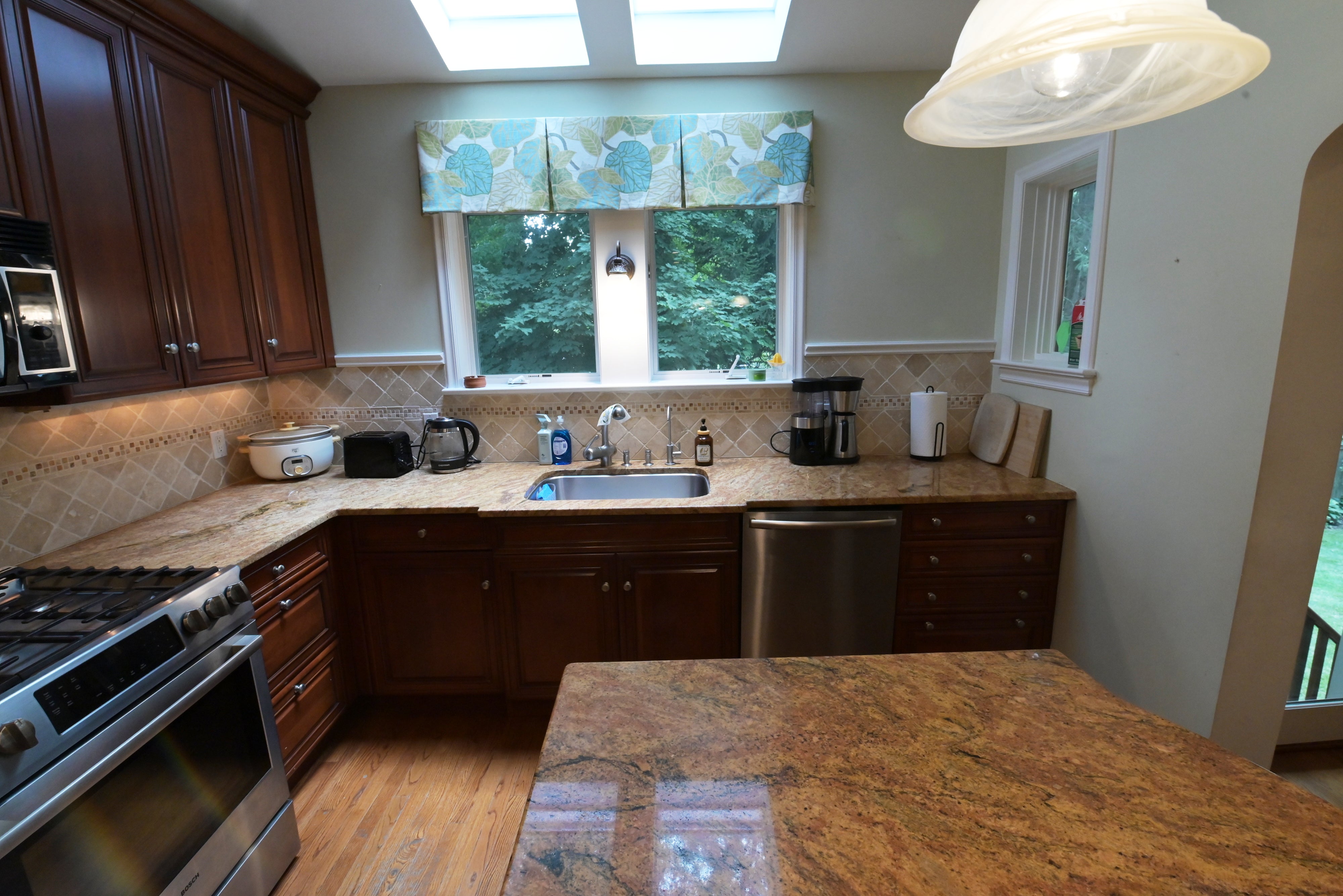 Brookhaven Traditional Wooden Kitchen with Island & Sub-Zero Refrigerator