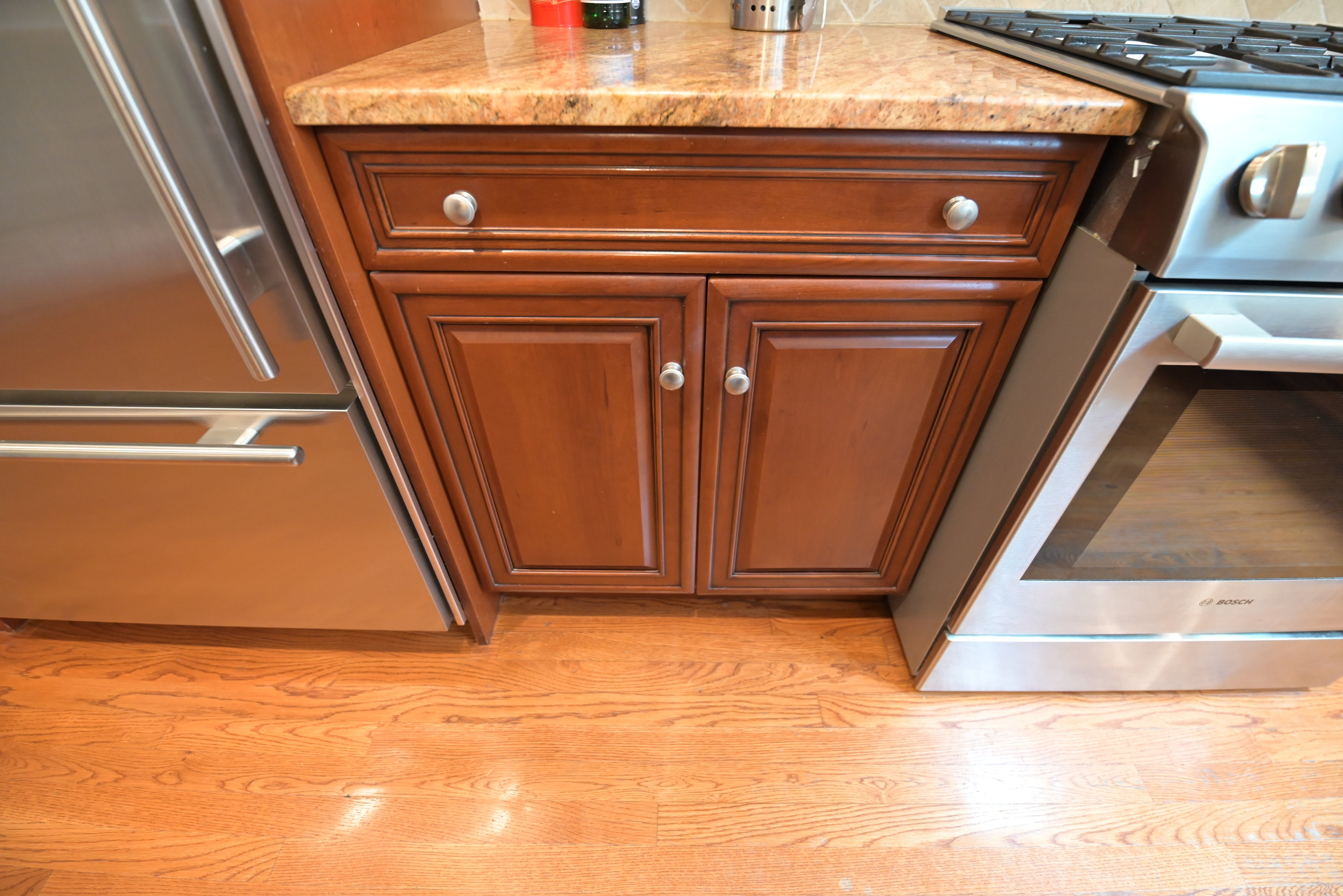 Brookhaven Traditional Wooden Kitchen with Island & Sub-Zero Refrigerator