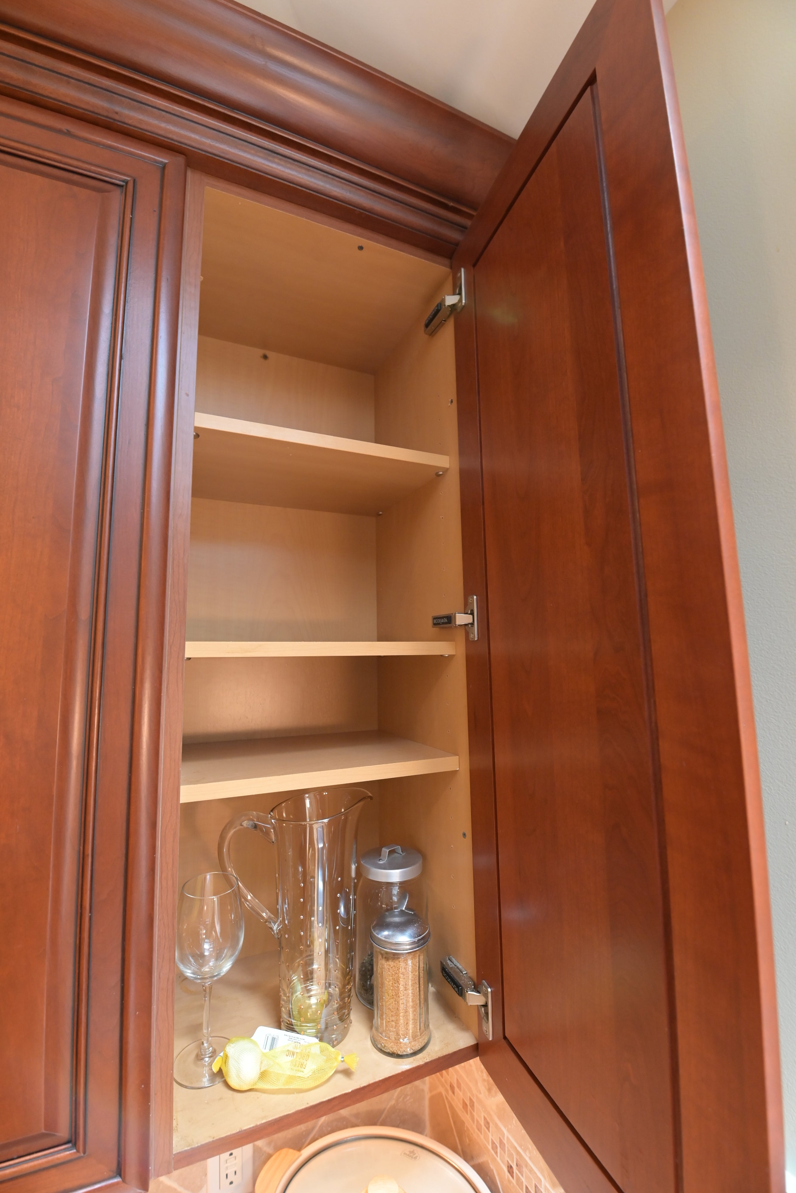 Brookhaven Traditional Wooden Kitchen with Island & Sub-Zero Refrigerator