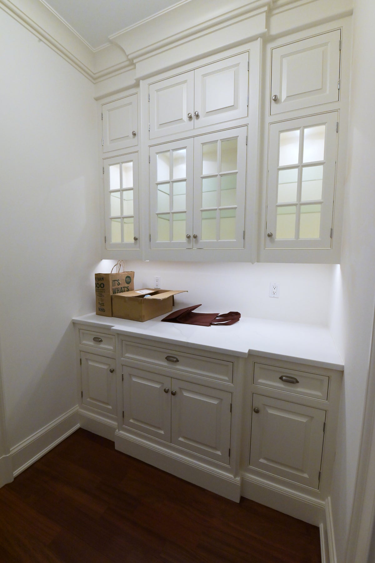 High-end residential furniture grade white kitchen pantry with shaker doors