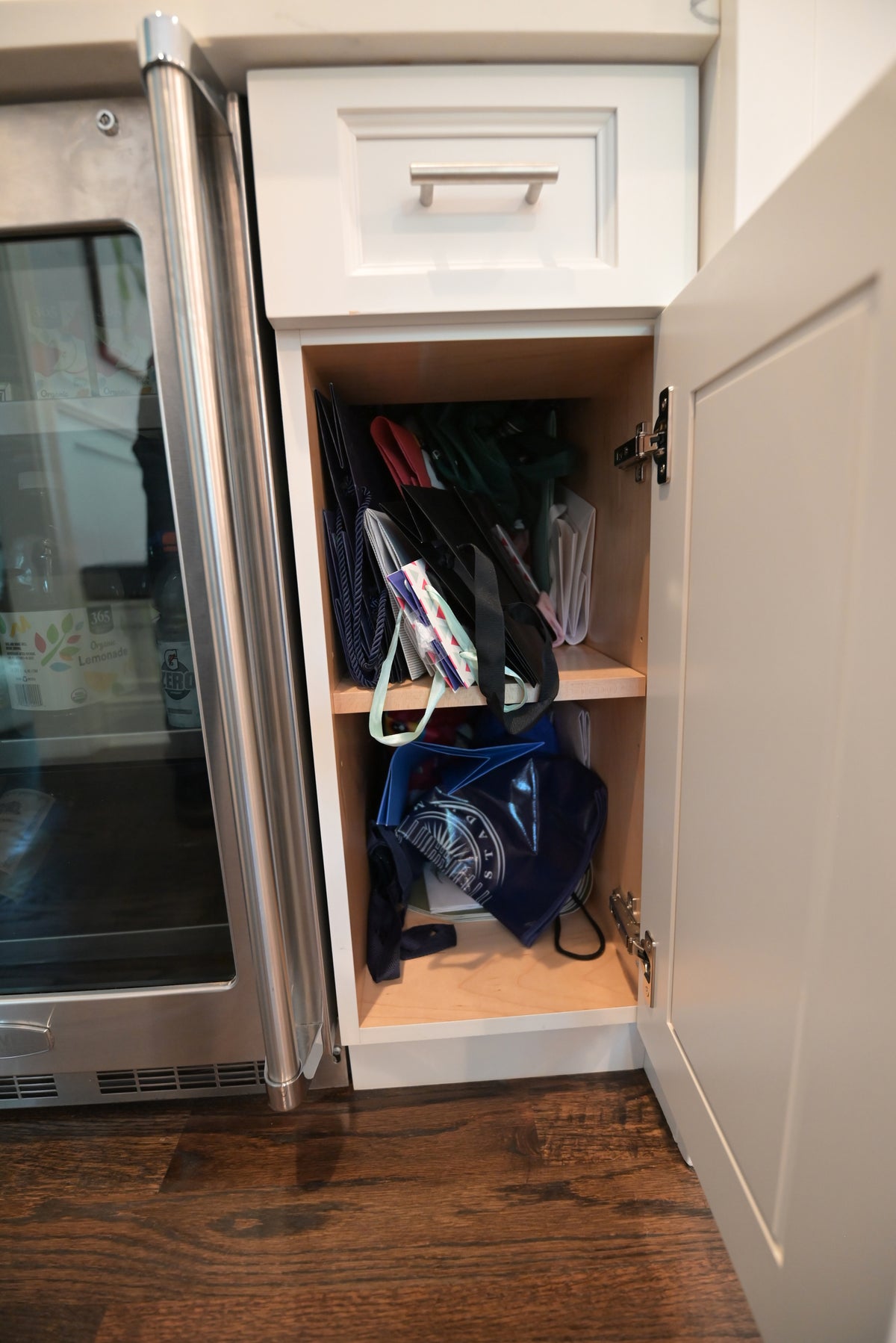 "The Claridge" Transitional White Kitchen with Island & Wolf Appliances