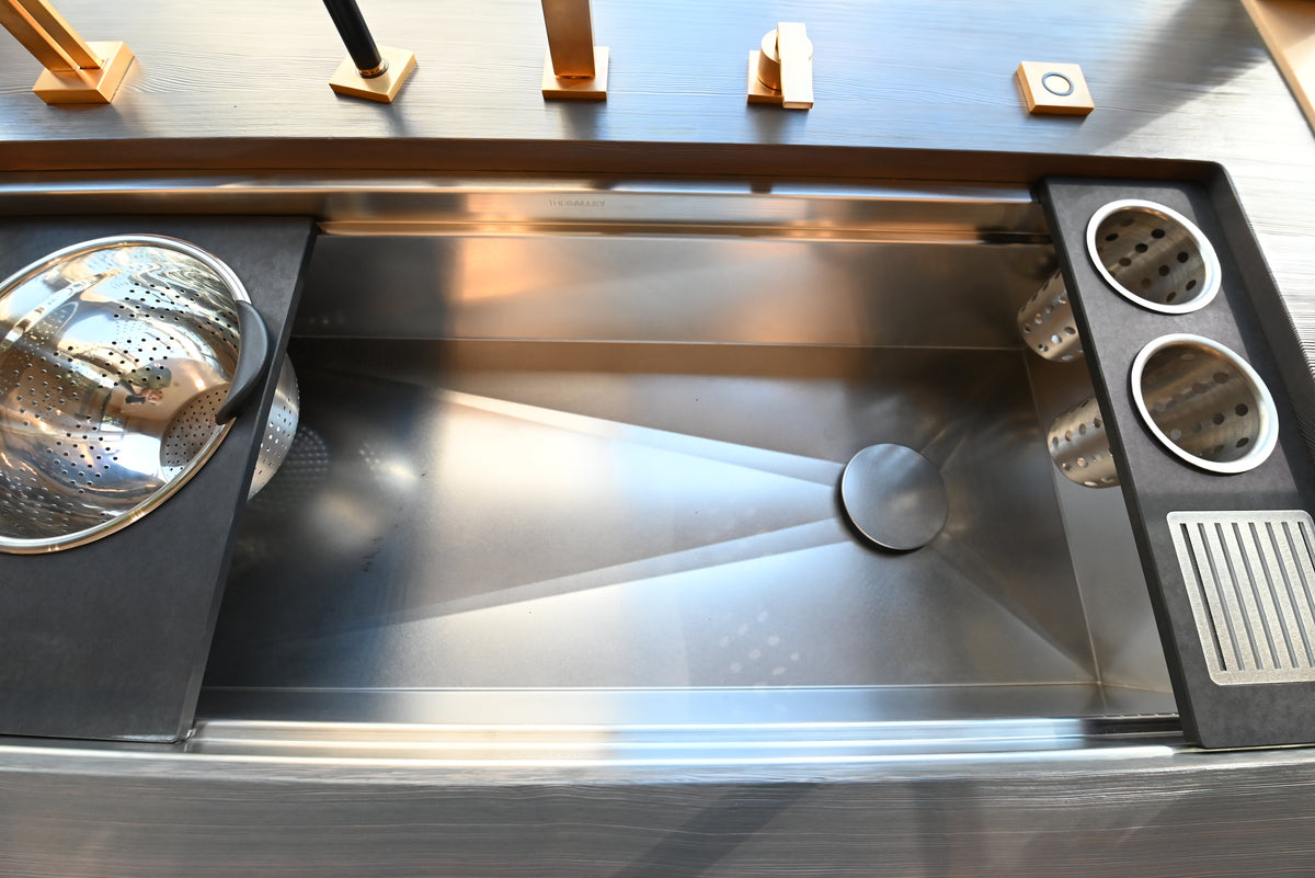 The Galley stainless steel workstation sink with Dornbracht gold faucet set