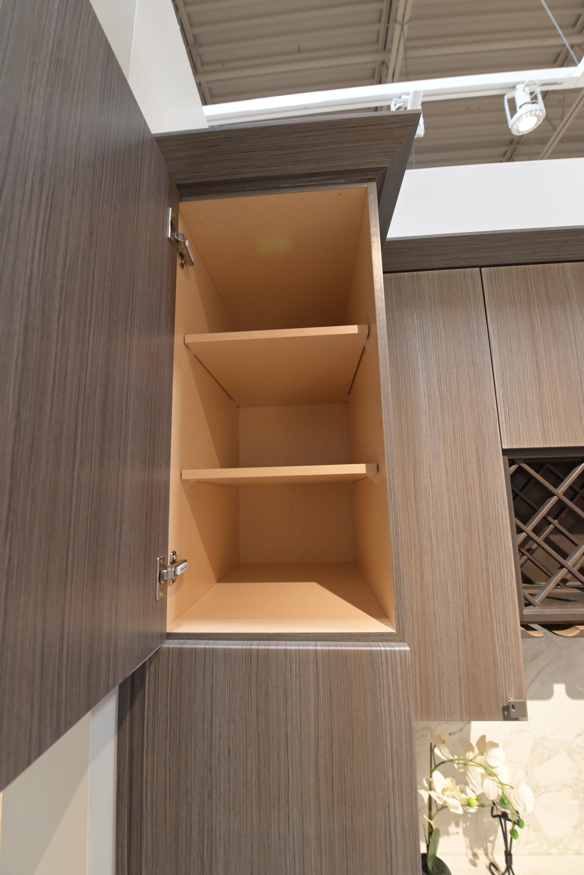 Contemporary built-in wet bar with storage and counter space