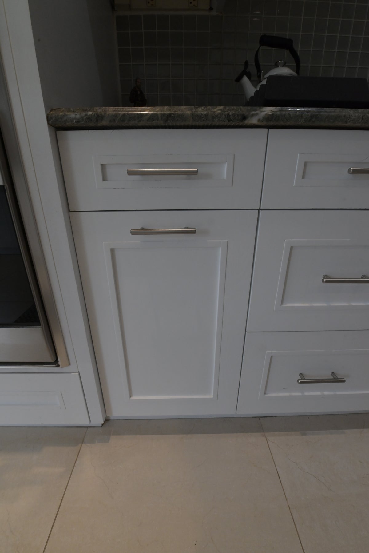 "The Roxbury" Transitional White Kitchen with Island & Sub-Zero Refrigerator