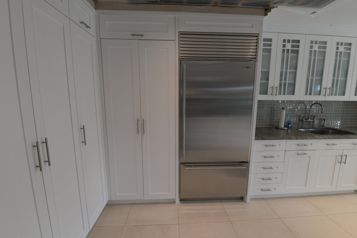 "The Roxbury" Transitional White Kitchen with Island & Sub-Zero Refrigerator