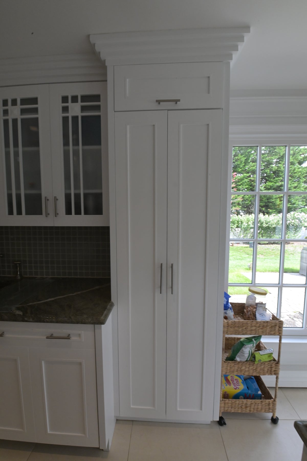 "The Roxbury" Transitional White Kitchen with Island & Sub-Zero Refrigerator