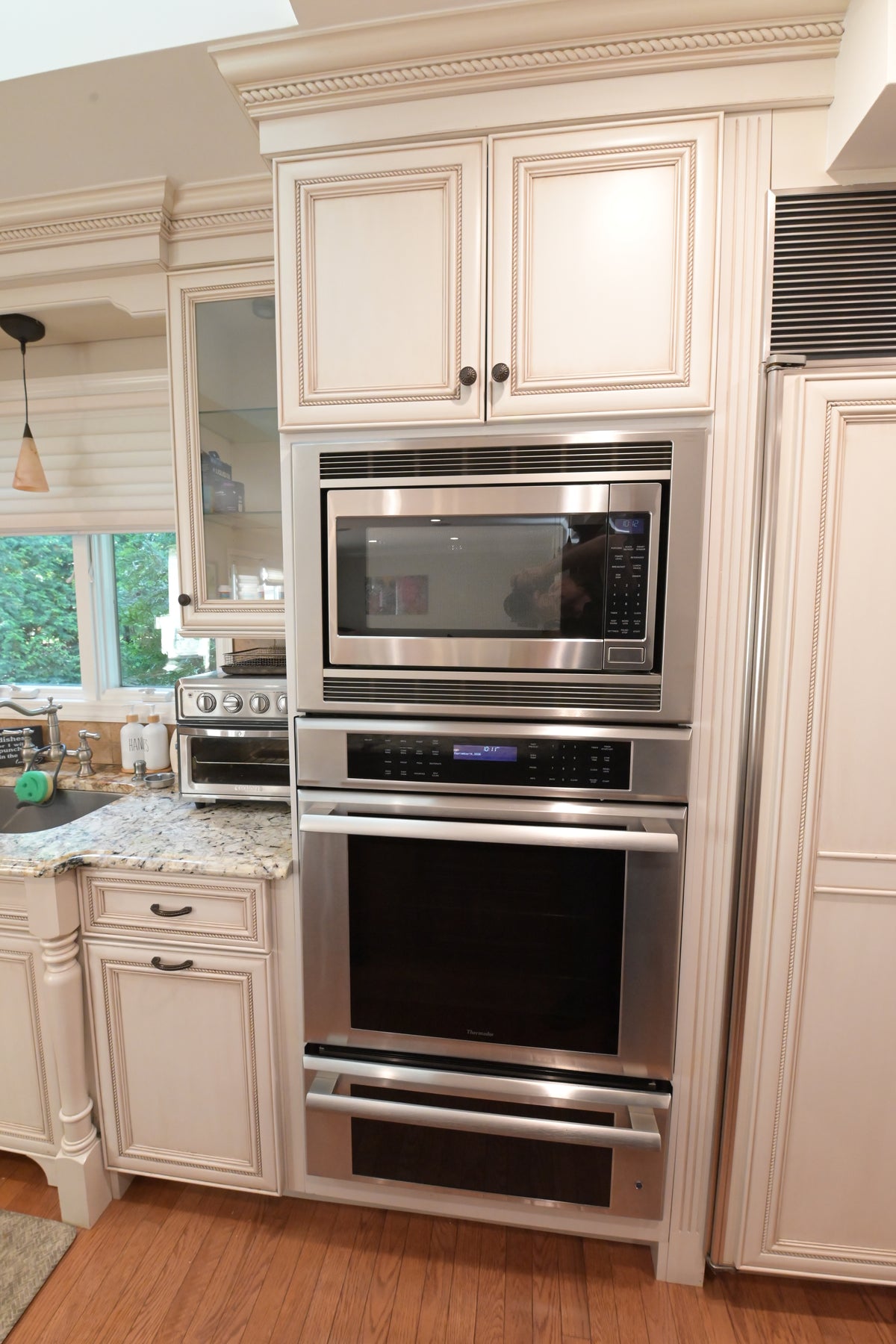 "The Chester" Traditional White Kitchen with Island, Desk Area & Appliances