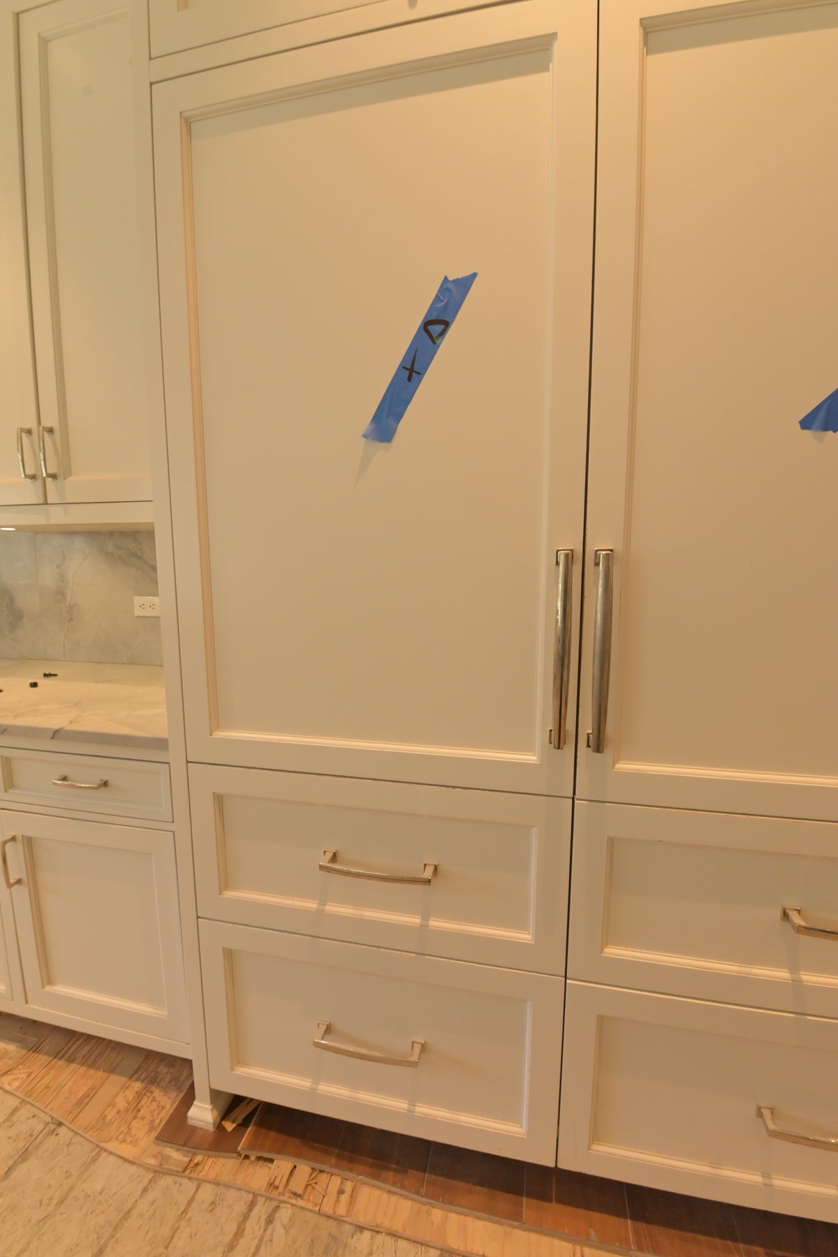 "The Blenheim" Transitional White Kitchen with Island & Sub-Zero Refrigerators