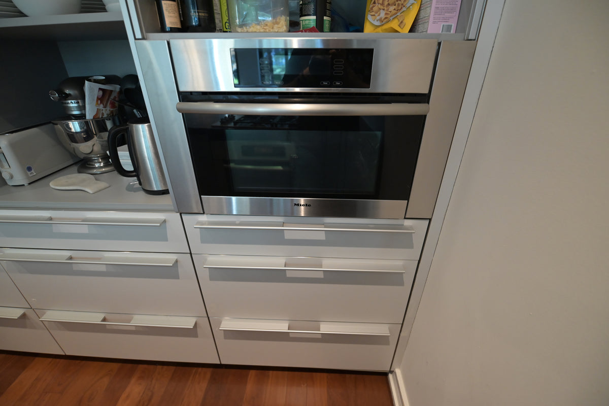Bulthaup Modern Gray & White Kitchen with Miele Appliances