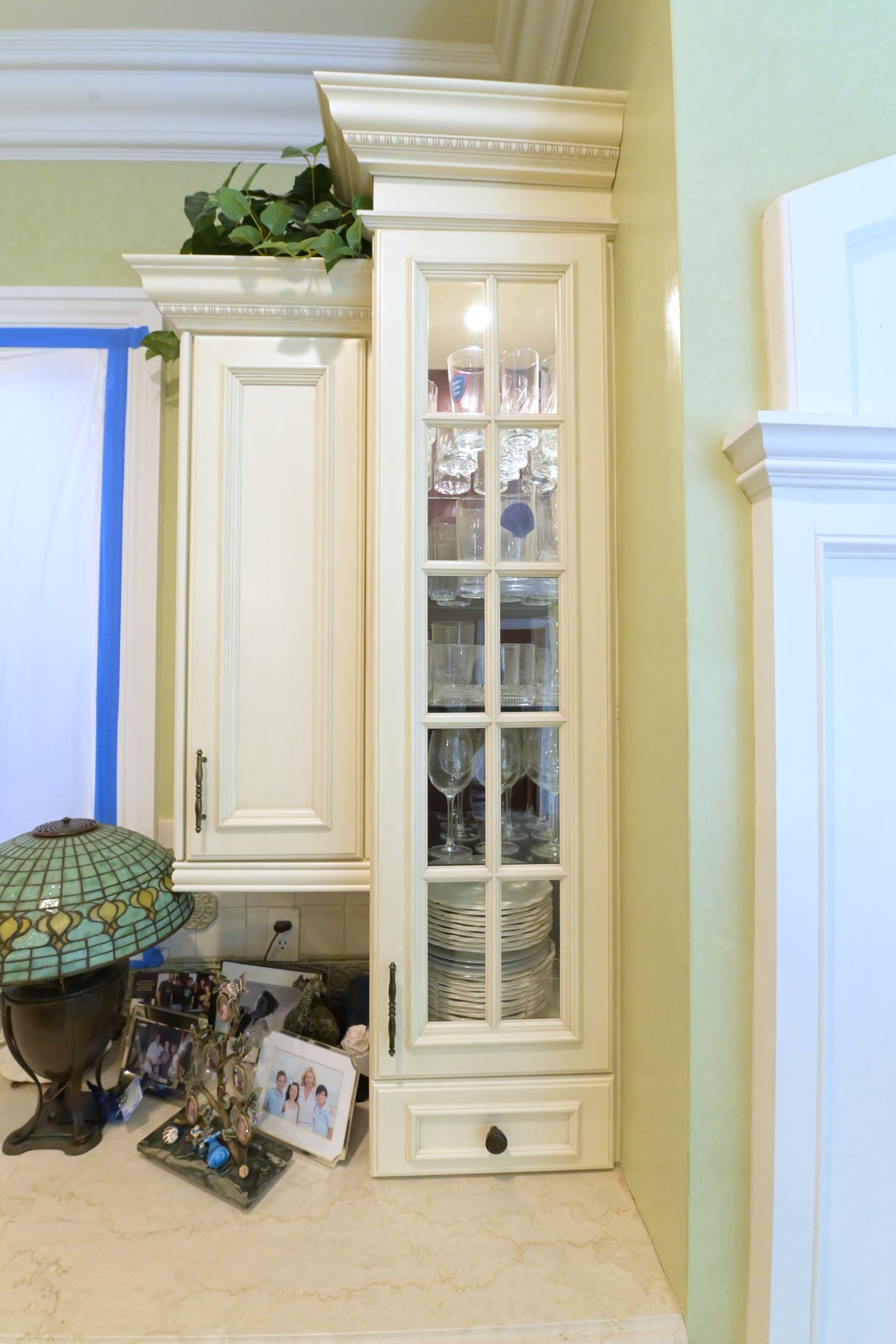 Kitchen Craft Traditional Light Cream Kitchen with Island & Appliances