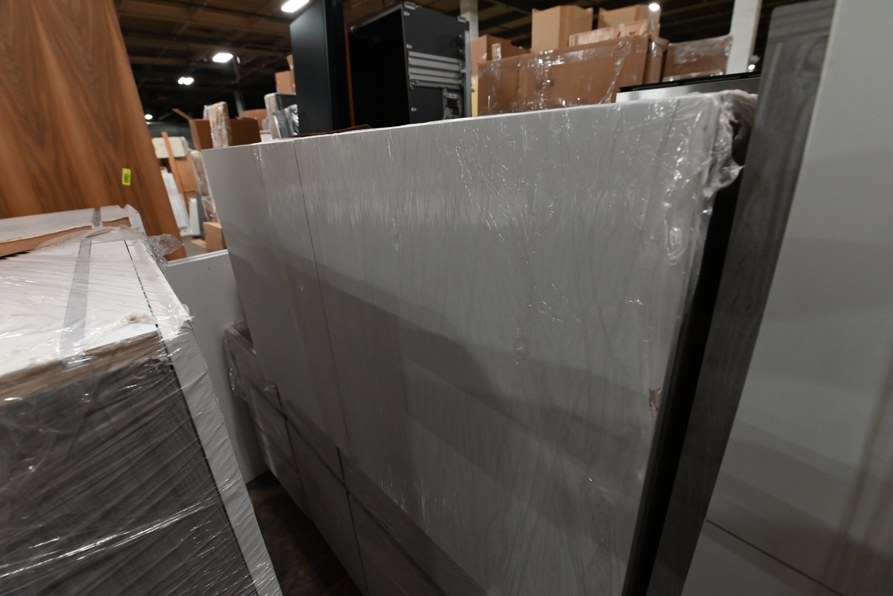 "The Strata" Modern White Textured Wood Kitchen with Island and Quartz Countertops
