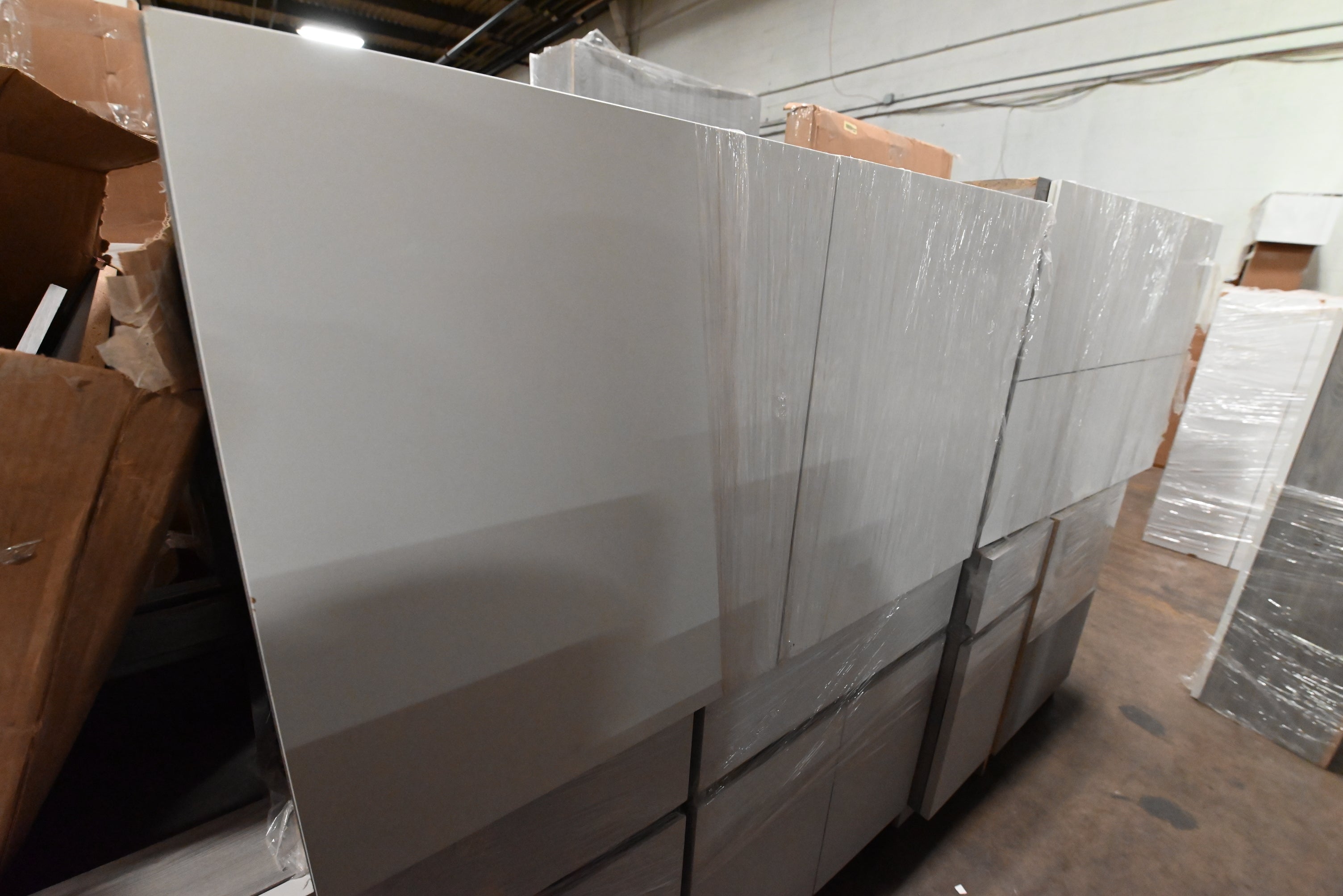 "The Strata" Modern White Textured Wood Kitchen with Island and Quartz Countertops