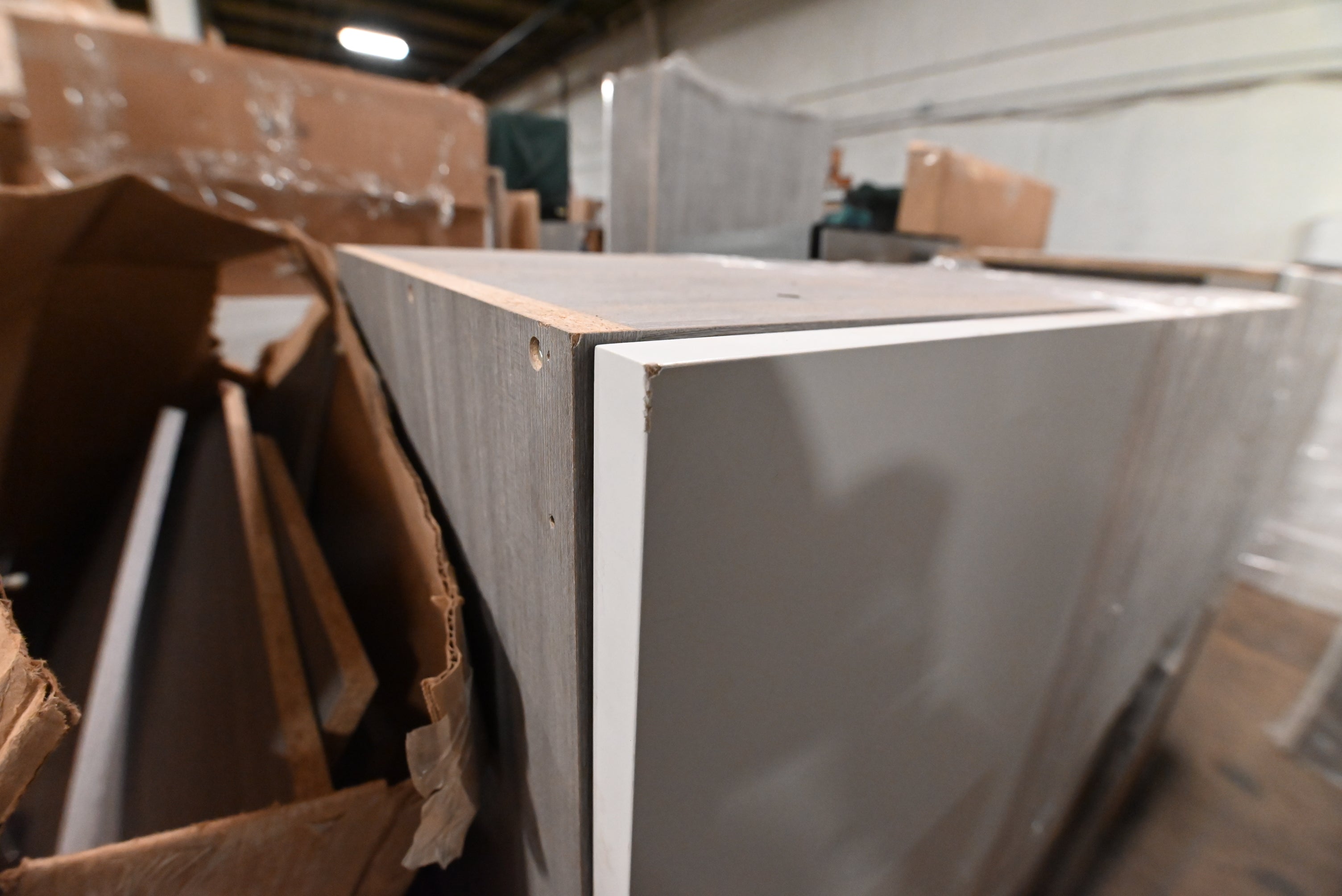 "The Strata" Modern White Textured Wood Kitchen with Island and Quartz Countertops