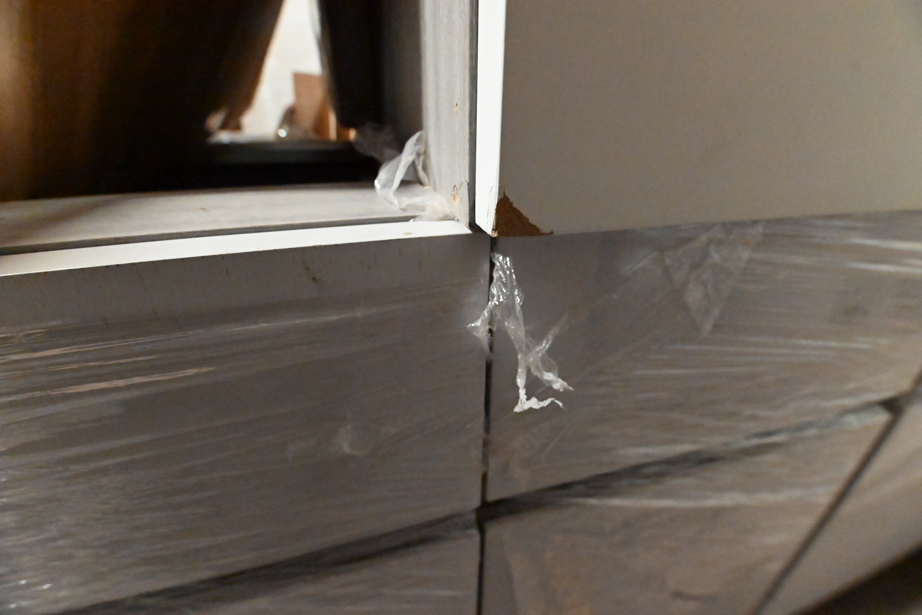 "The Strata" Modern White Textured Wood Kitchen with Island and Quartz Countertops