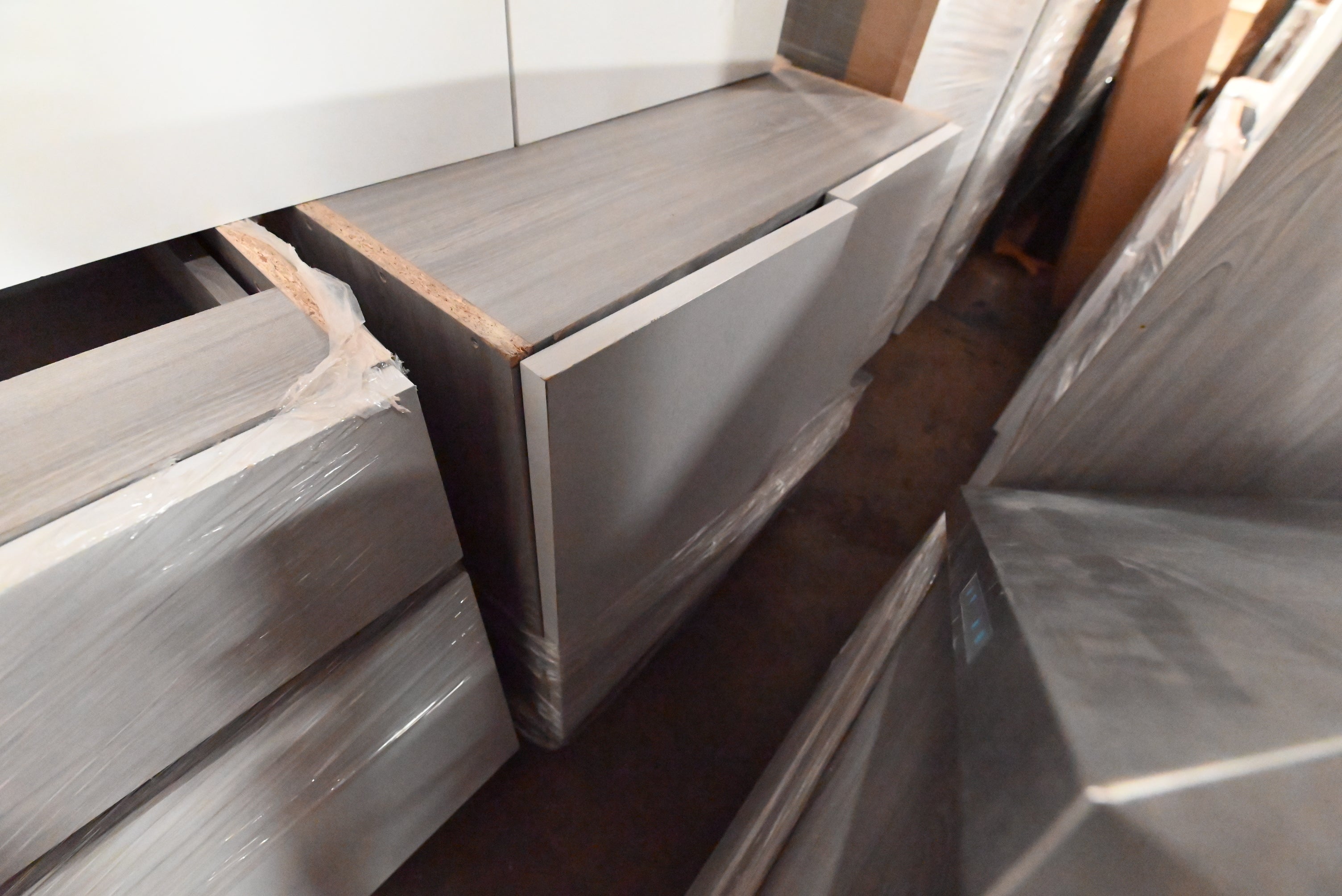 "The Strata" Modern White Textured Wood Kitchen with Island and Quartz Countertops